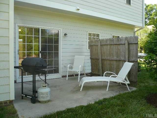 8008 Strawberry Meadows Street Raleigh, NC 27613 - Photo 11 of 12 The back patio is a great place to grill out and entertain friends!