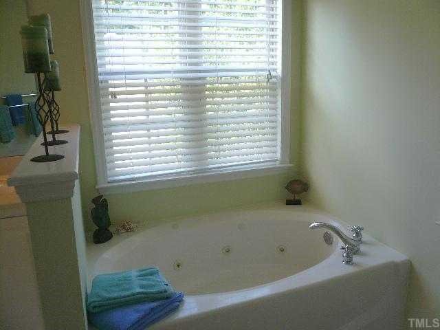 8008 Strawberry Meadows Street Raleigh, NC 27613 - Photo 9 of 12 The master bath includes a whirlpool soaking tub and separate shower!