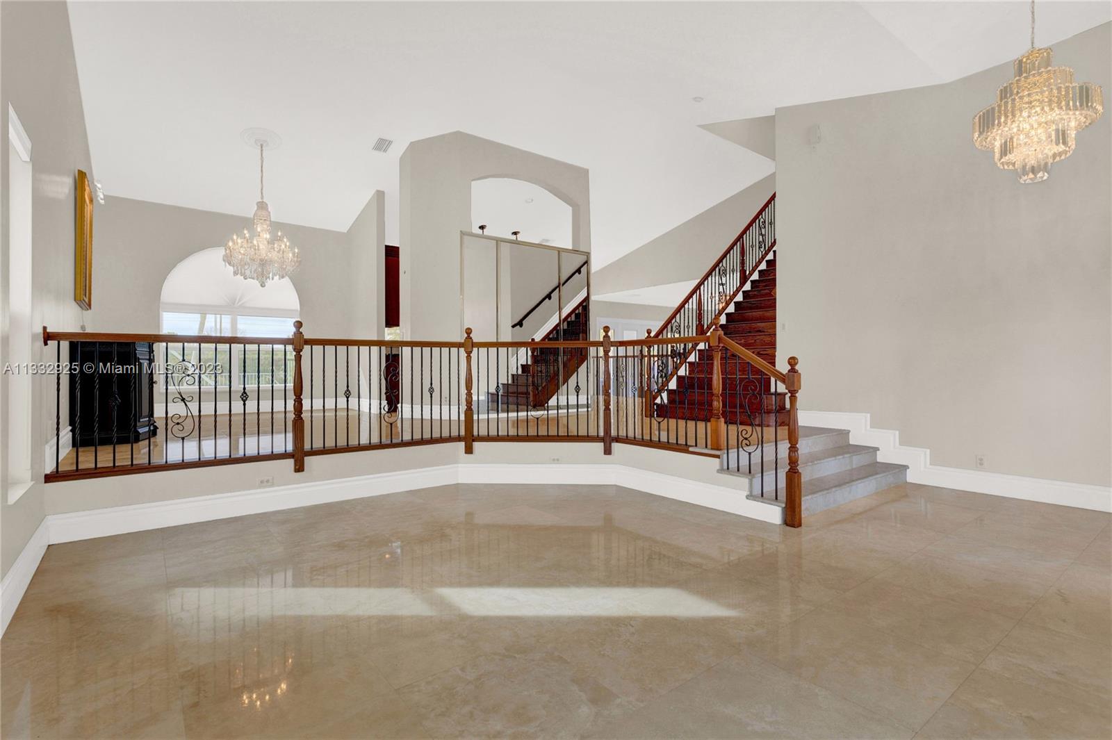 19610 Dinner Key Drive Boca Raton, FL 33498 - Photo 3 of 27 a view of a hallway with staircase