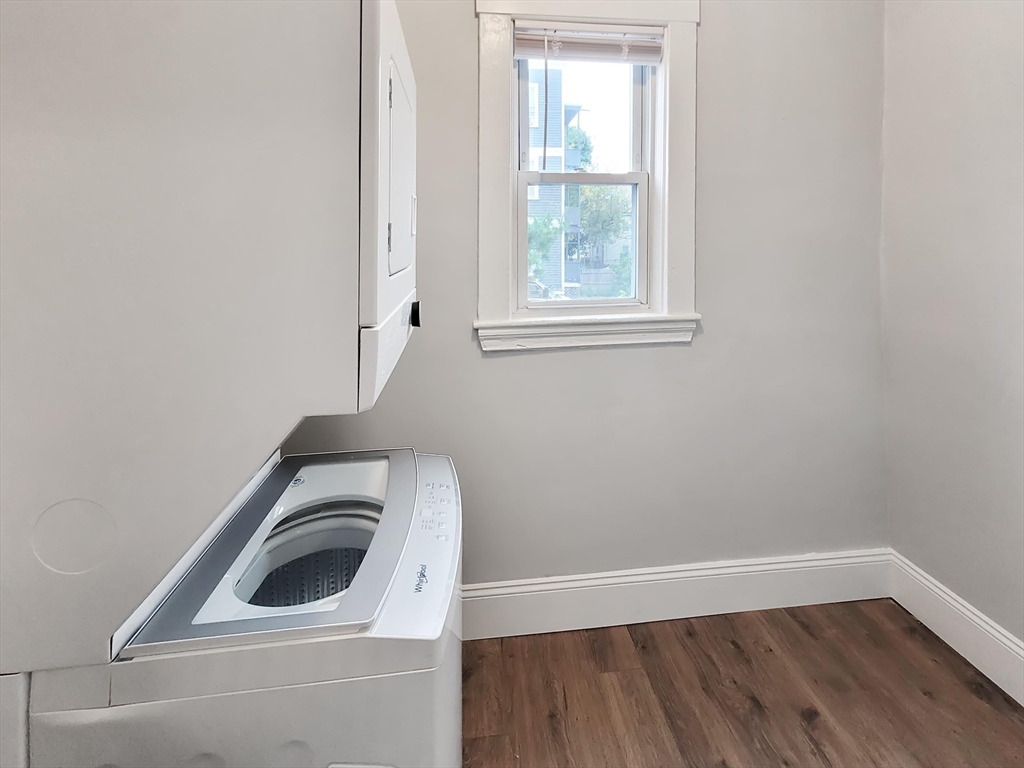 108 Callender Street, Unit 2 Boston, MA 02124 - Photo 10 of 11 a utility room with dryer and washer