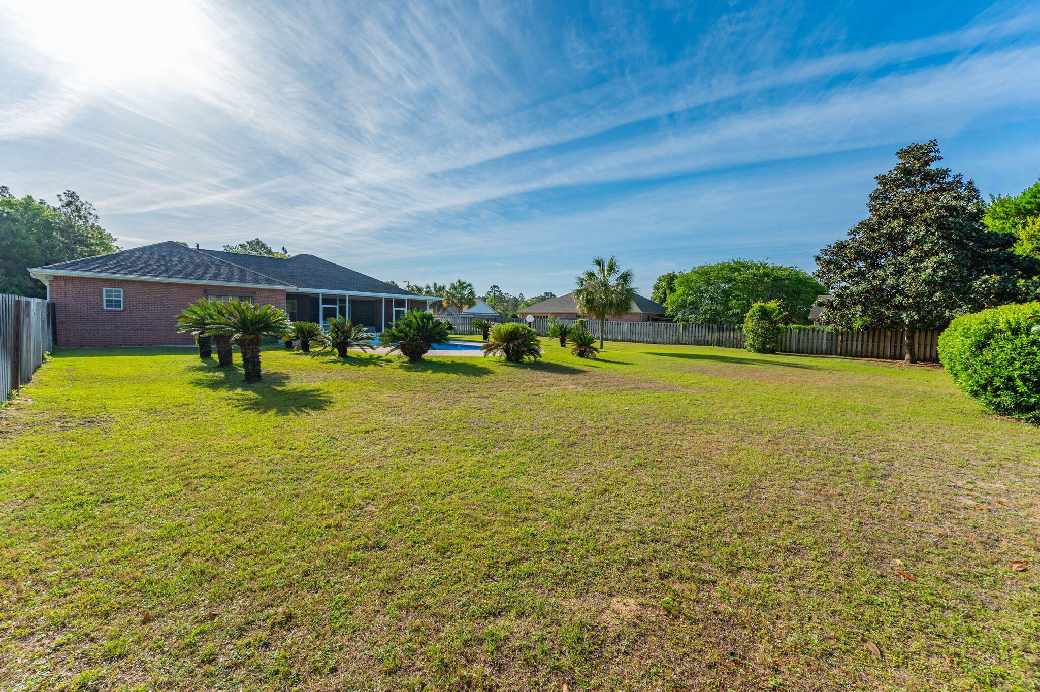 5552 Frontier Drive Crestview, FL 32536 - Photo 47 of 50 a view of a swimming pool and an outdoor seating