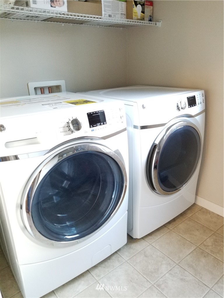 4818 155th Place Southwest, Unit 11 Edmonds, WA 98026 - Photo 25 of 30 a utility room with dryer and washer