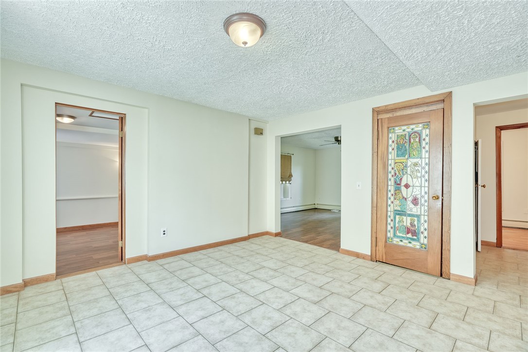 27 Martin Street Webster, NY 14580 - Photo 12 of 48 DINING ROOM - CUSTOM STAINED GLASS DOOR
