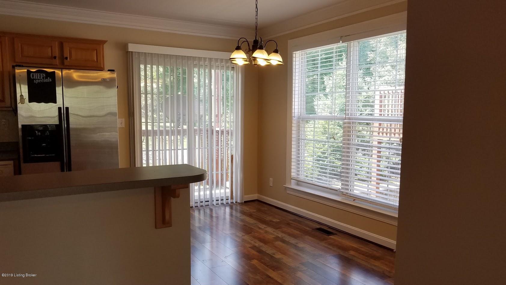 9515 Rustling Tree Way, Unit 102 Louisville, KY 40291 - Photo 7 of 27 Great Room overlooking breakfast bar and kitchen