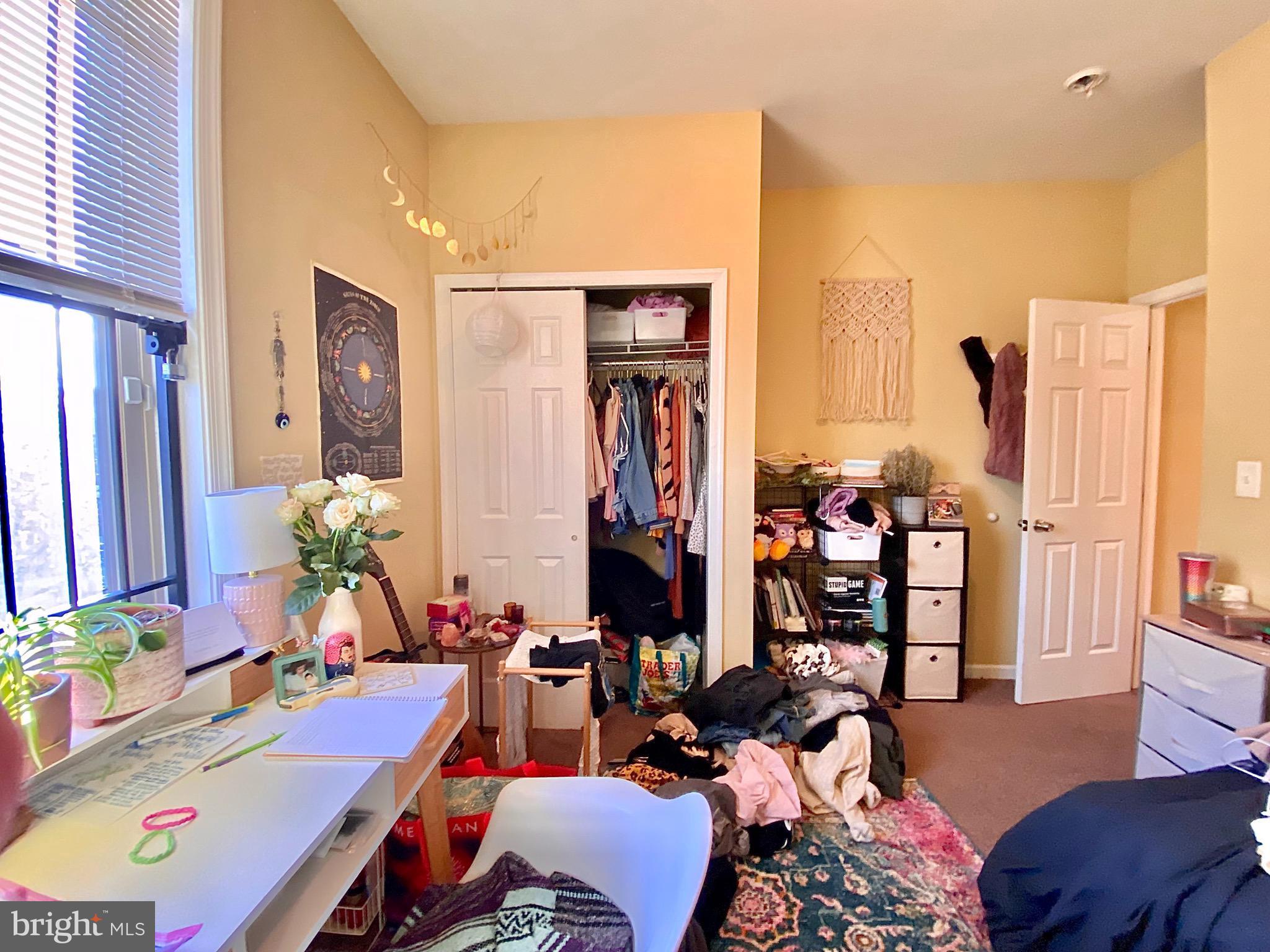 1618 Page Street, Unit A Philadelphia, PA 19121 - Photo 9 of 17 a children room with furniture and a mirror