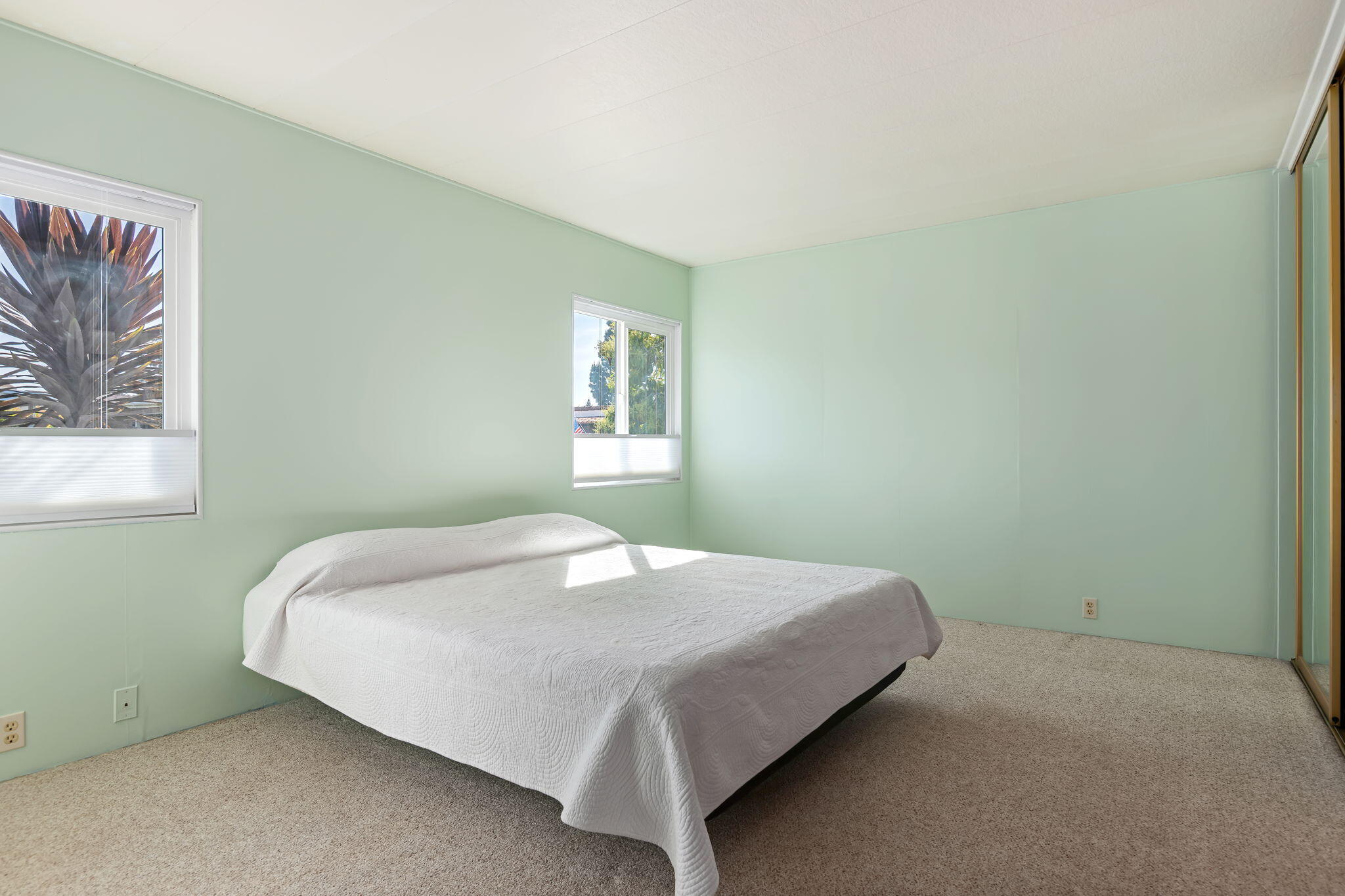 340 Old Mill Road, Unit 186 Santa Barbara, CA 93110 - Photo 21 of 40 a bedroom with a bed and window