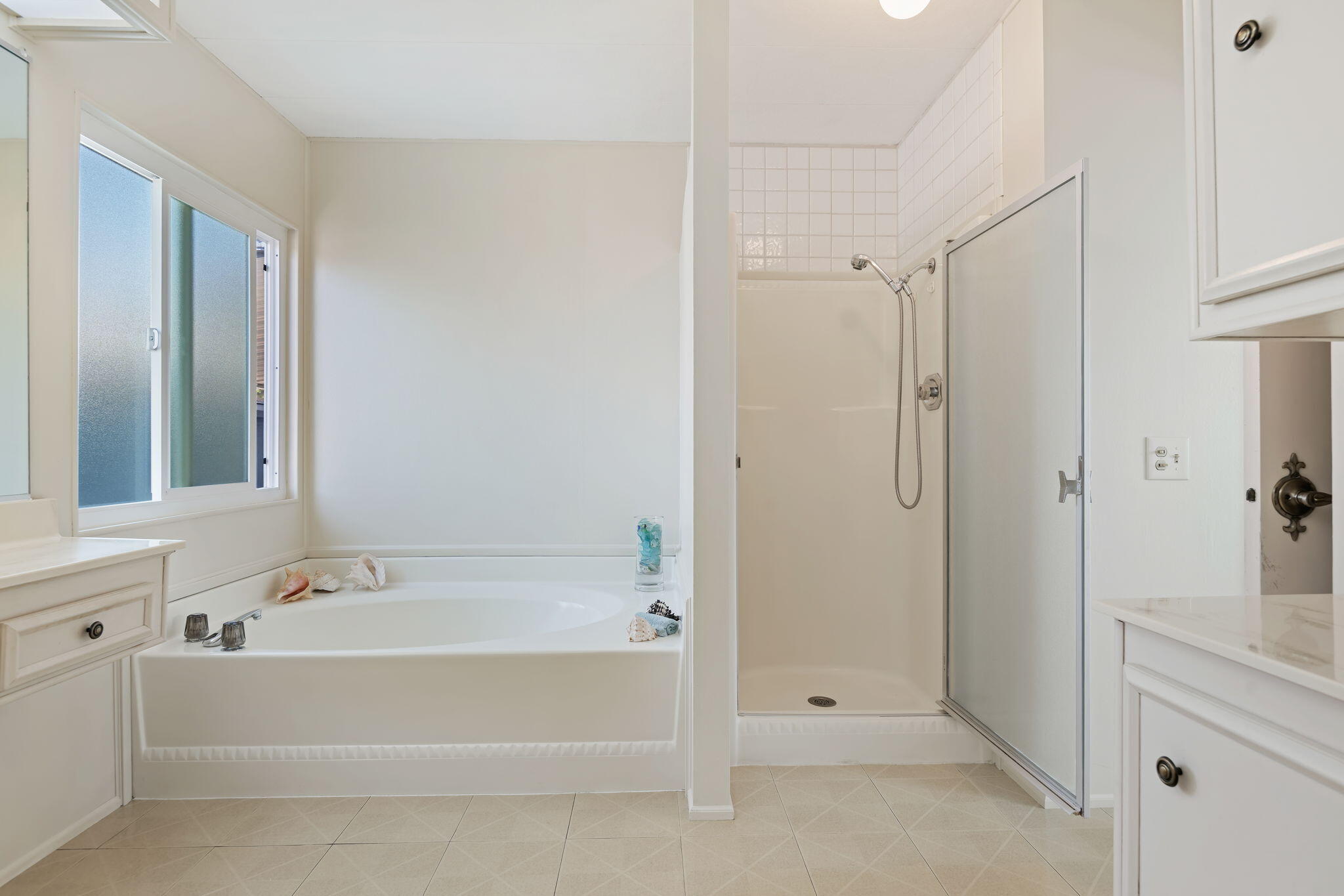 340 Old Mill Road, Unit 186 Santa Barbara, CA 93110 - Photo 24 of 40 a bathroom with a bathtub and a shower