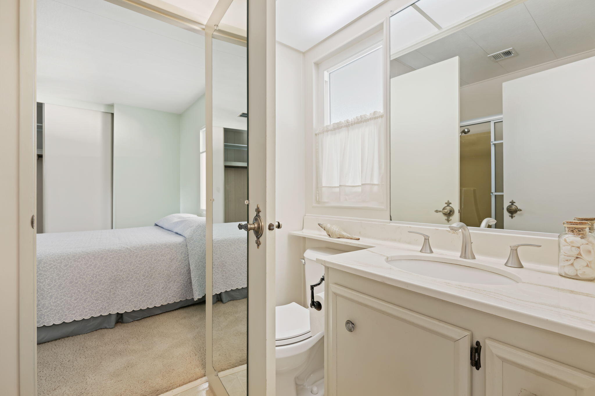 340 Old Mill Road, Unit 186 Santa Barbara, CA 93110 - Photo 26 of 40 a bathroom with a sink and a mirror