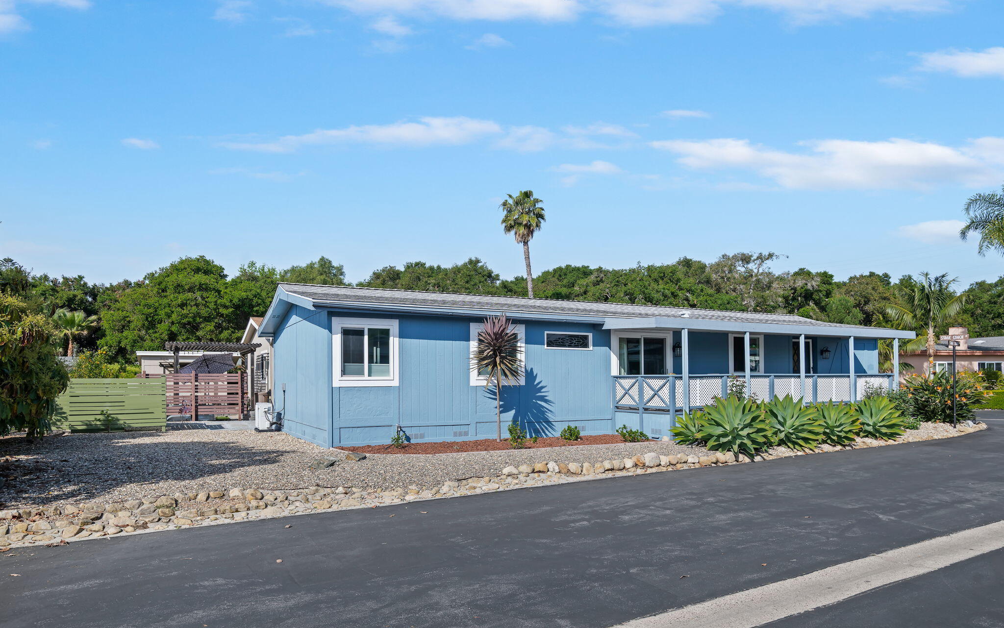 340 Old Mill Road, Unit 186 Santa Barbara, CA 93110 - Photo 7 of 40 a front view of a house with a garden