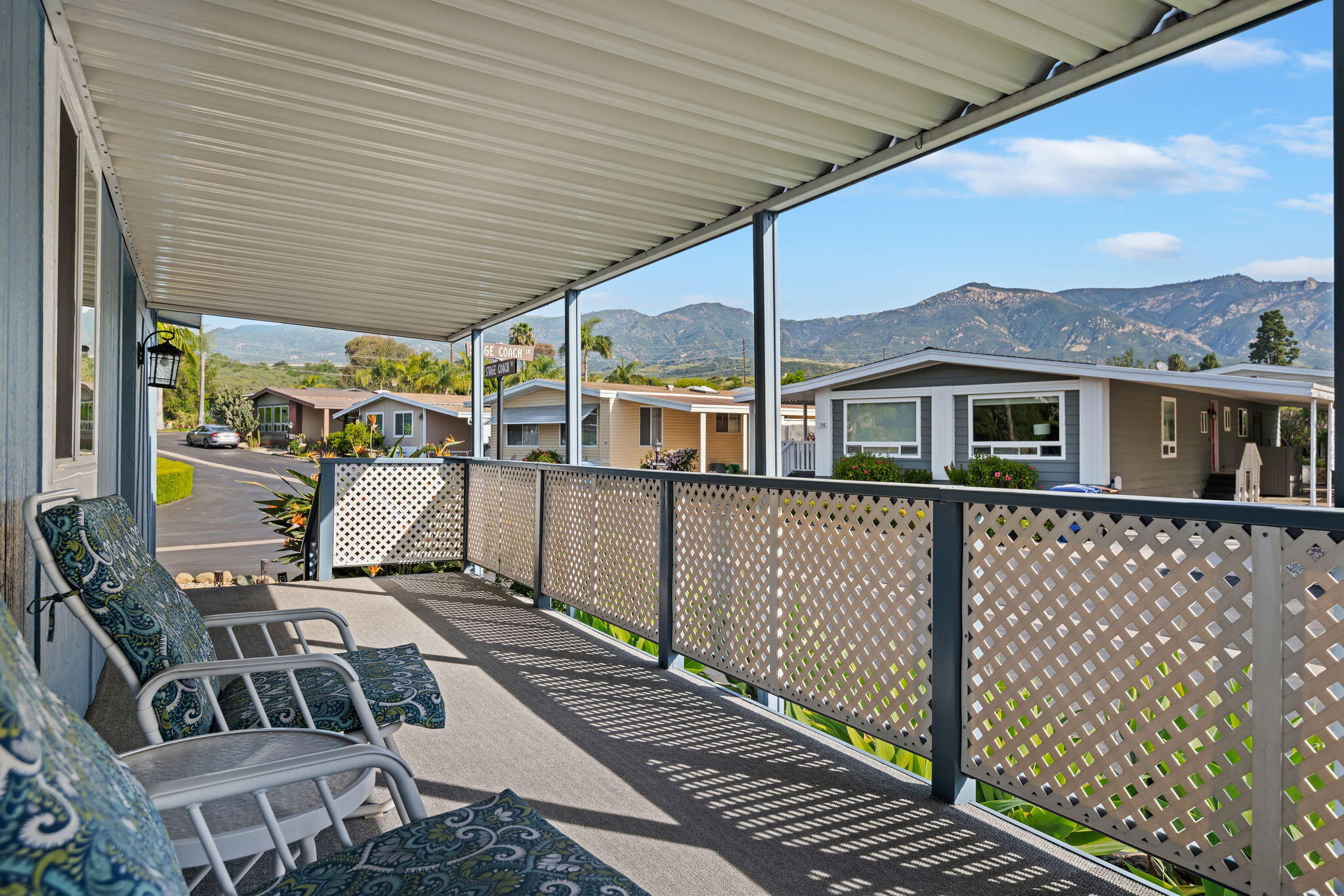 340 Old Mill Road, Unit 186 Santa Barbara, CA 93110 - Photo 9 of 40 a view of a patio with table and chairs and wooden floor