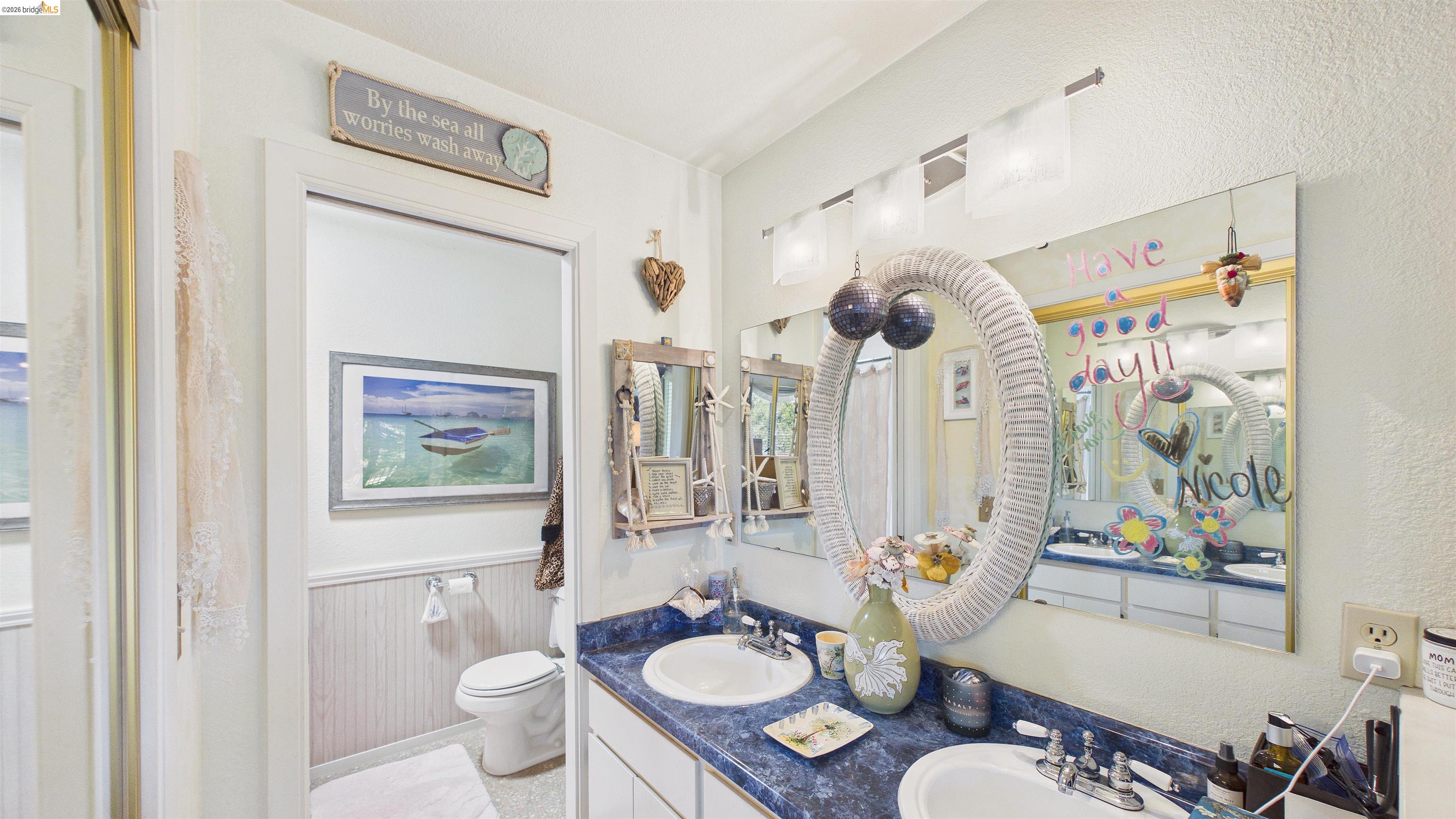 18102 Mt Eaton Road Tuolumne, CA 95379 - Photo 16 of 44 Dual vanity with a blue countertop and integrated sinks