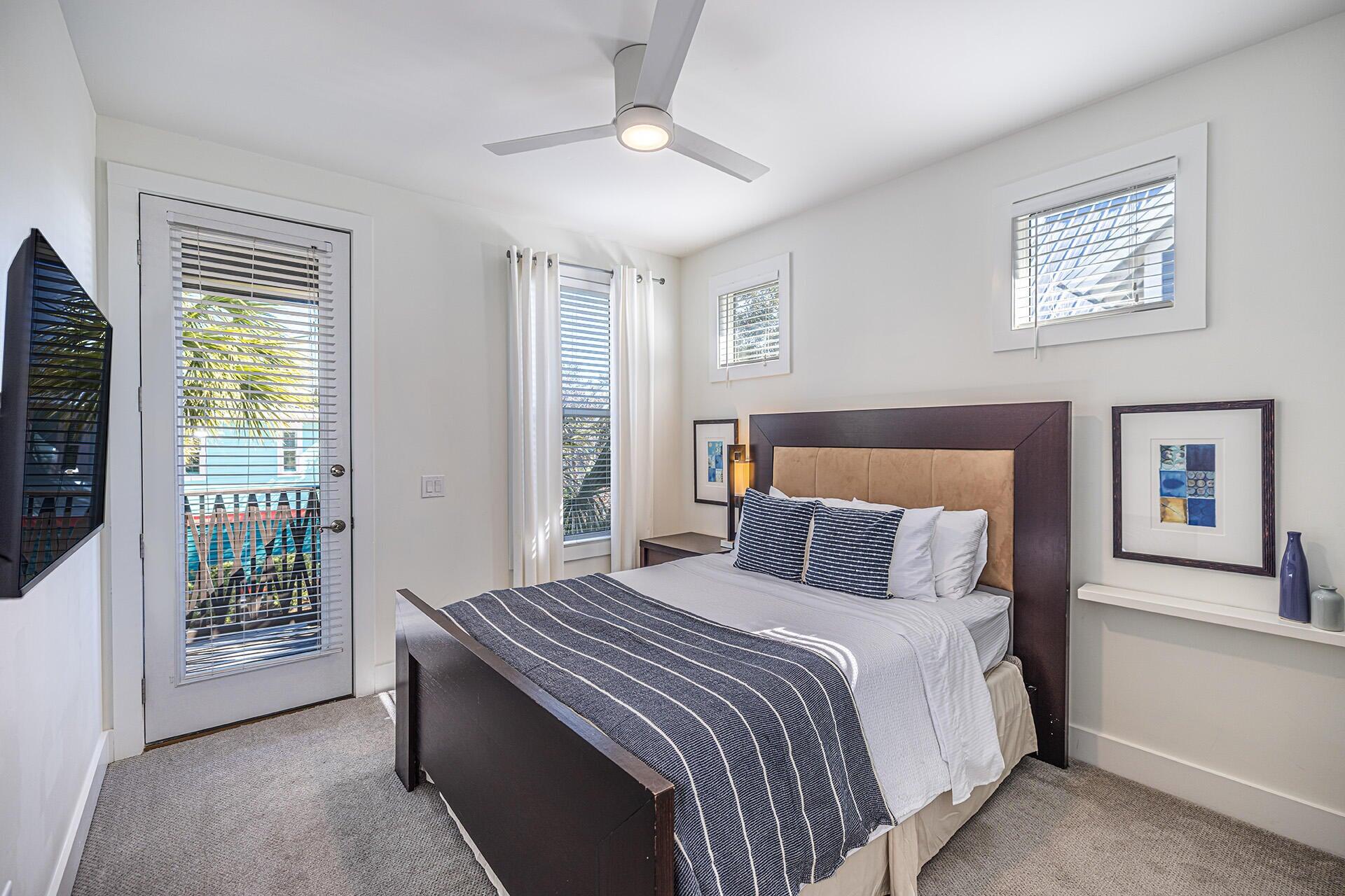 190 Seacrest Beach Boulevard West Seacrest, FL 32461 - Photo 16 of 37 a bedroom with a bed and a window