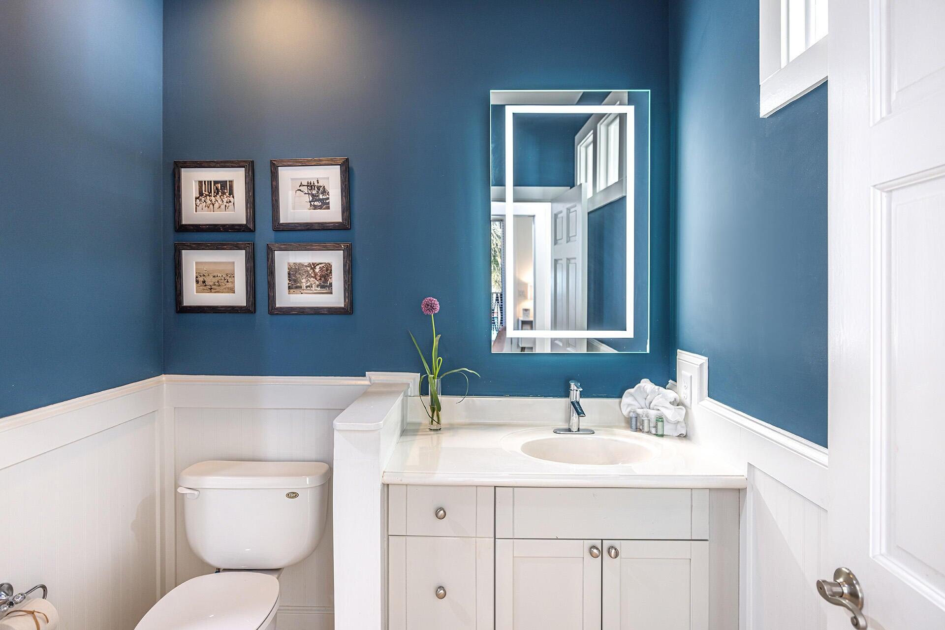 190 Seacrest Beach Boulevard West Seacrest, FL 32461 - Photo 20 of 37 a bathroom with a sink a toilet and mirror