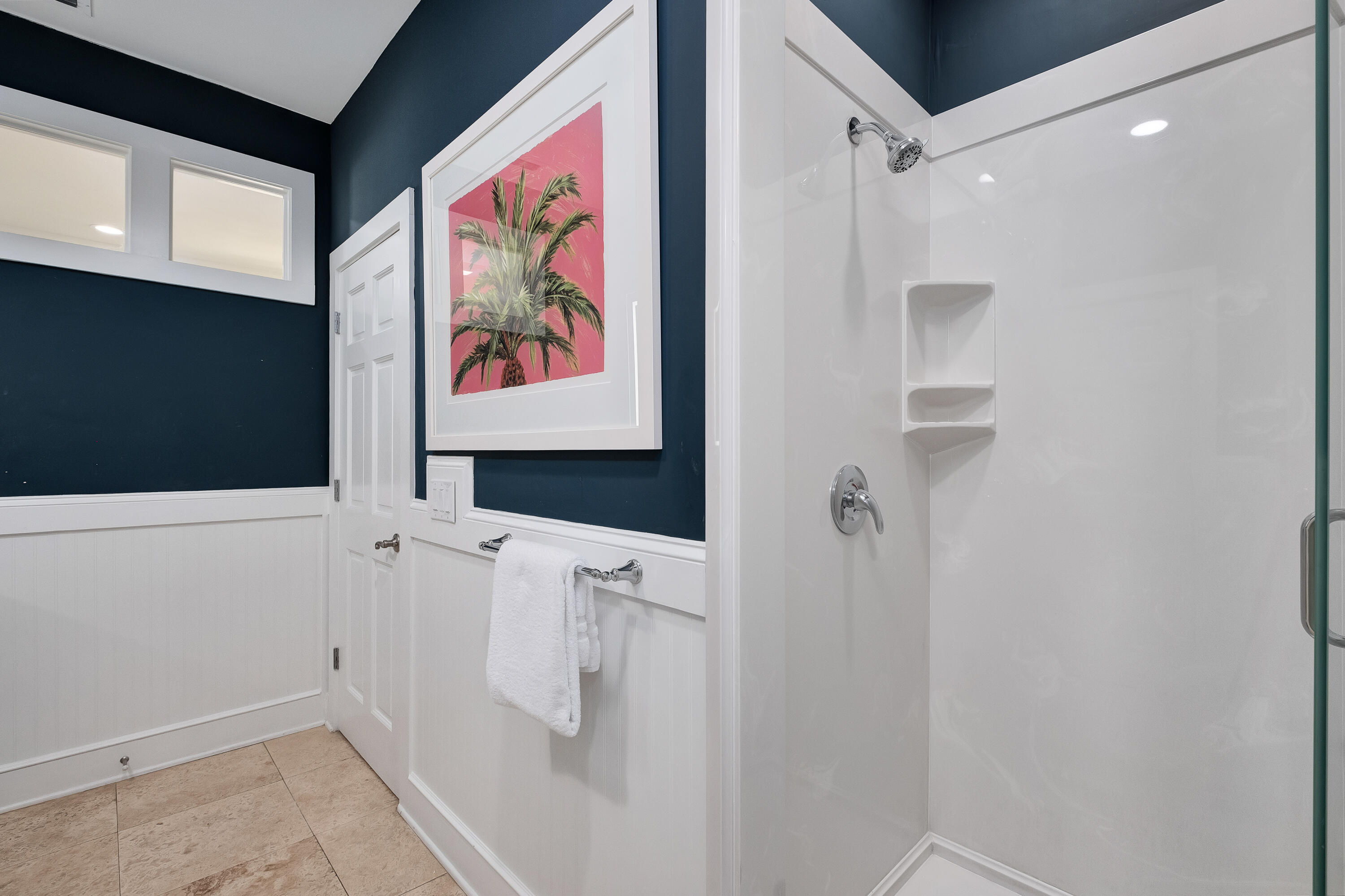 190 Seacrest Beach Boulevard West Seacrest, FL 32461 - Photo 21 of 37 a bathroom with a painting on the wall and shower