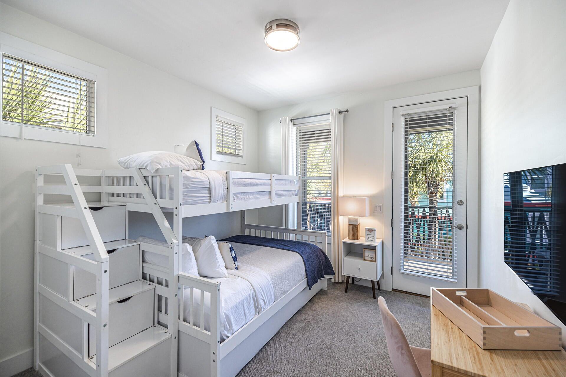 190 Seacrest Beach Boulevard West Seacrest, FL 32461 - Photo 22 of 37 a bedroom with a bed and a window