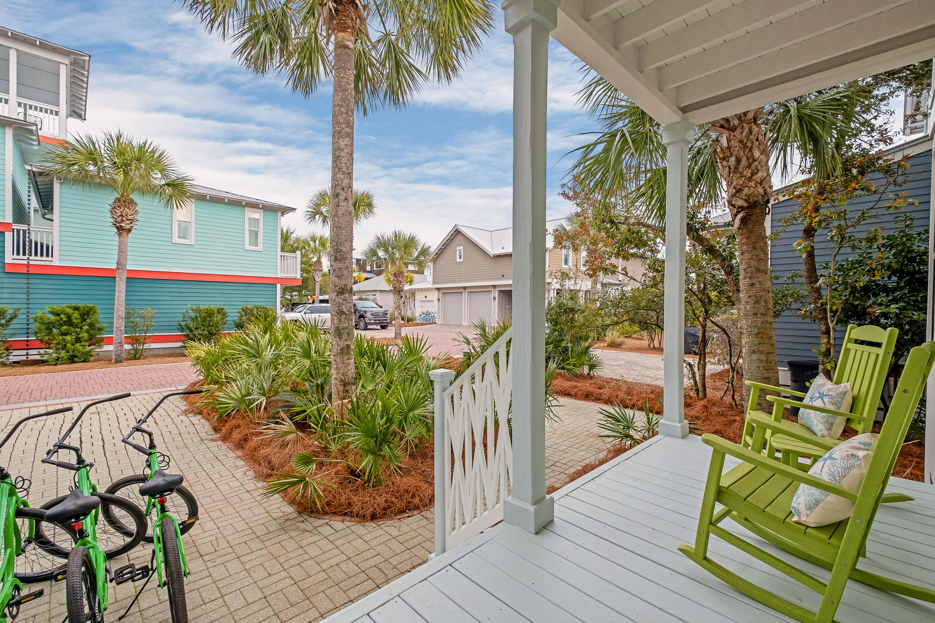 190 Seacrest Beach Boulevard West Seacrest, FL 32461 - Photo 25 of 37 a view of a porch with chairs and potted plants