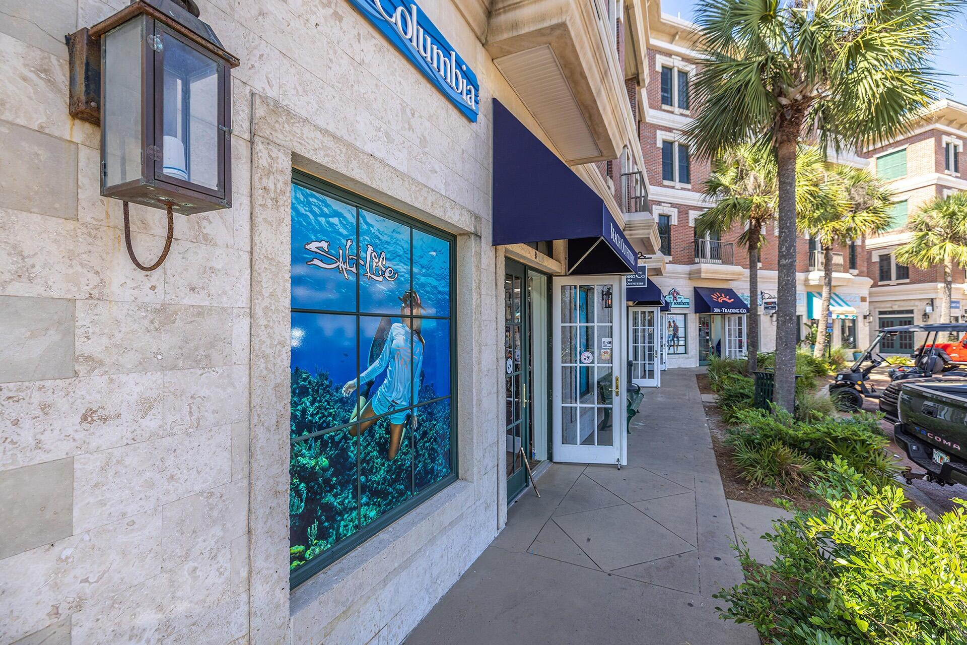 190 Seacrest Beach Boulevard West Seacrest, FL 32461 - Photo 37 of 37 a view of a brick house with a large windows and flower plants