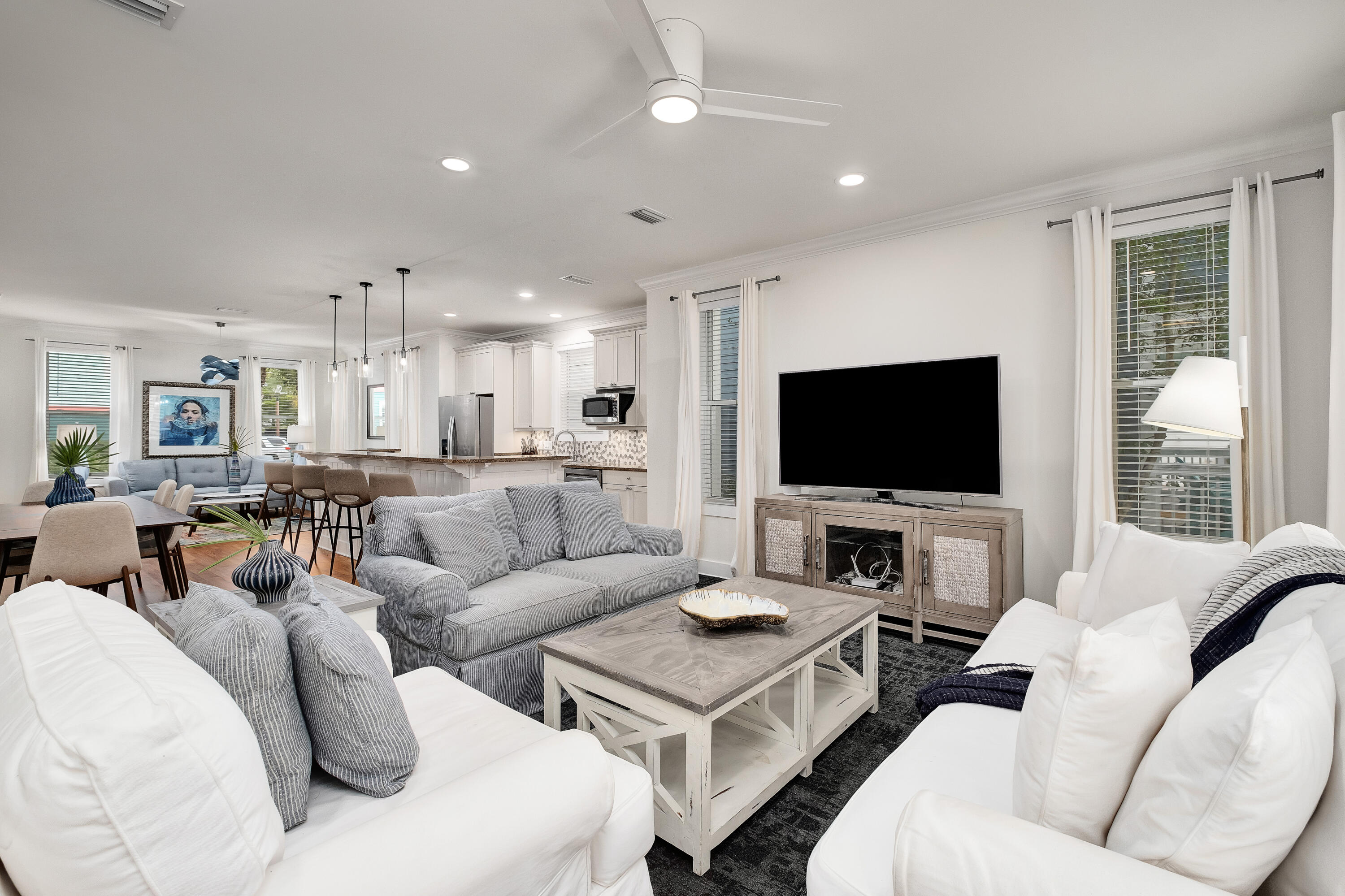 190 Seacrest Beach Boulevard West Seacrest, FL 32461 - Photo 7 of 37 a living room with furniture and a flat screen tv