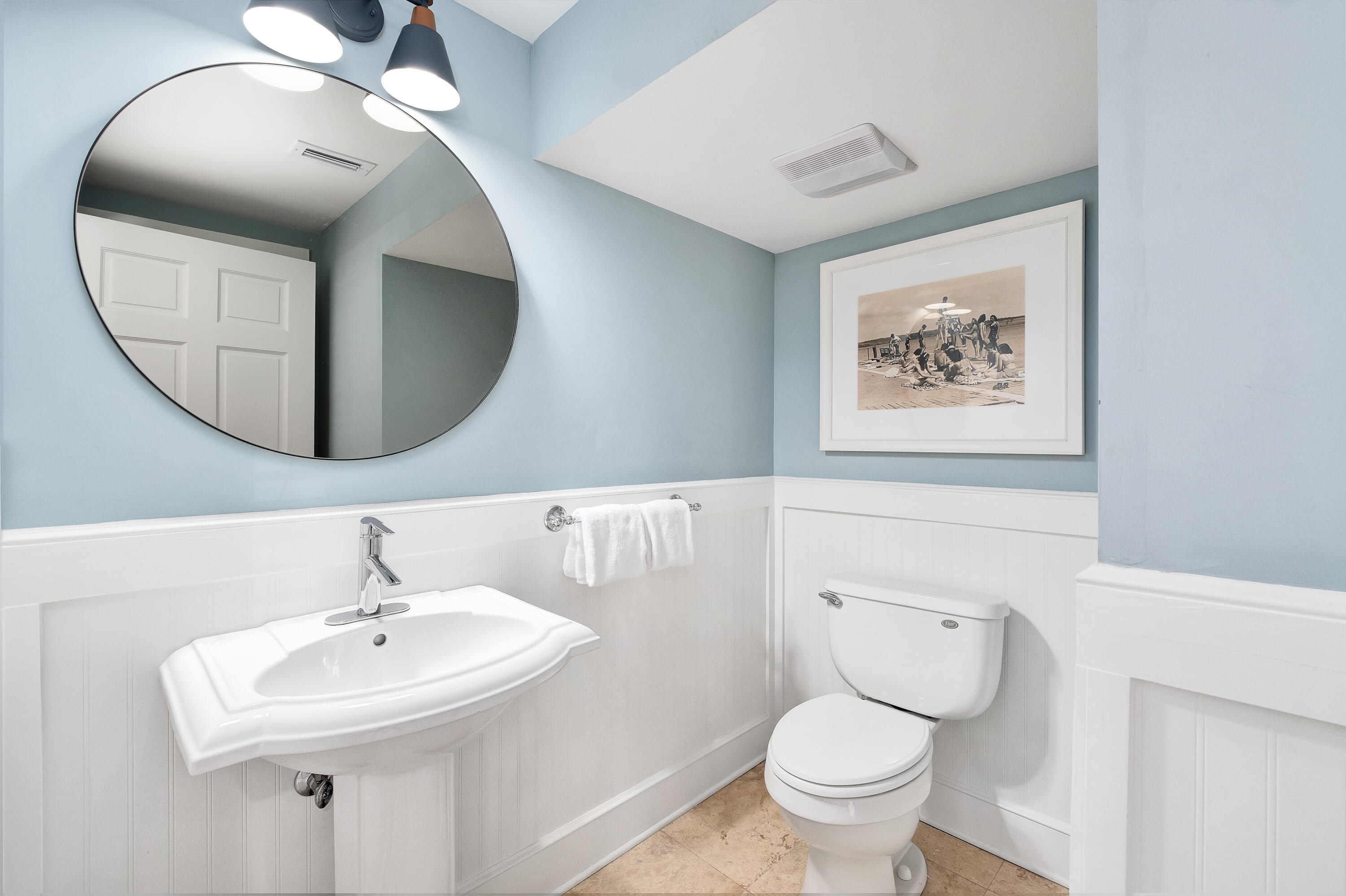 190 Seacrest Beach Boulevard West Seacrest, FL 32461 - Photo 9 of 37 a bathroom with a toilet a sink and a mirror