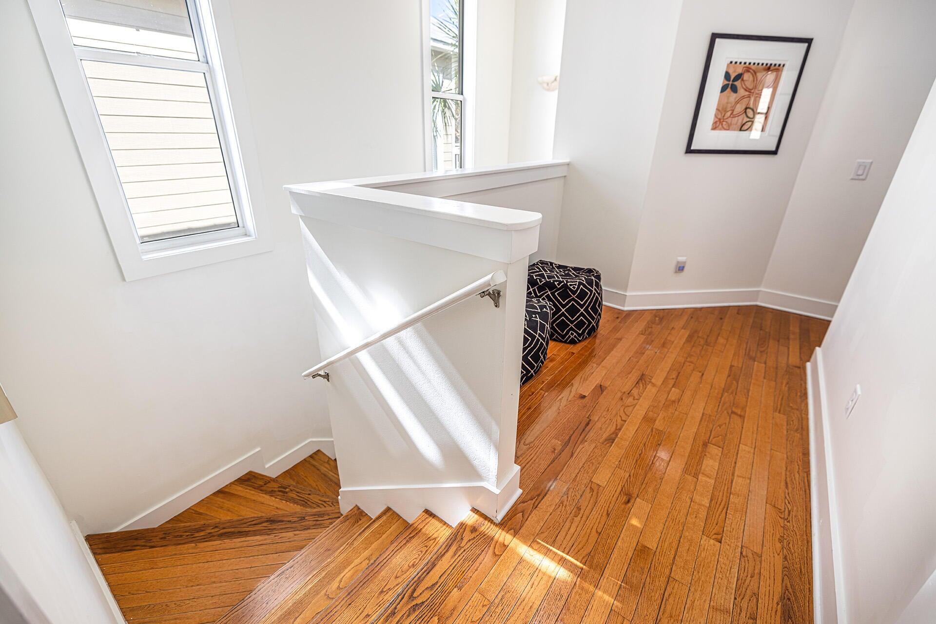 190 Seacrest Beach Boulevard West Seacrest, FL 32461 - Photo 10 of 37 a view of a bedroom with wooden floor and a window