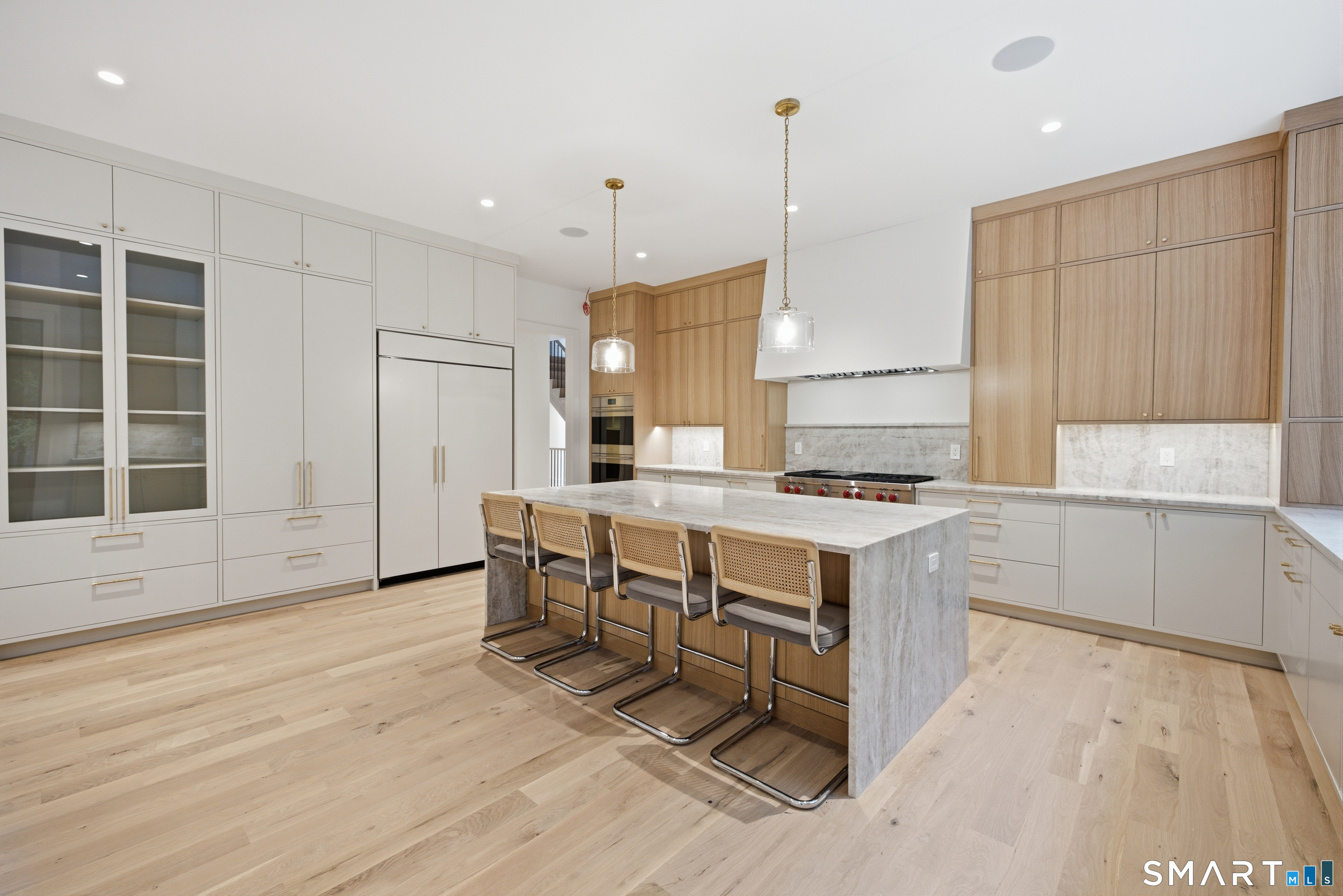 2 Windy Hill Road Westport, CT 06880 - Photo 8 of 40 a kitchen with a sink cabinets and window