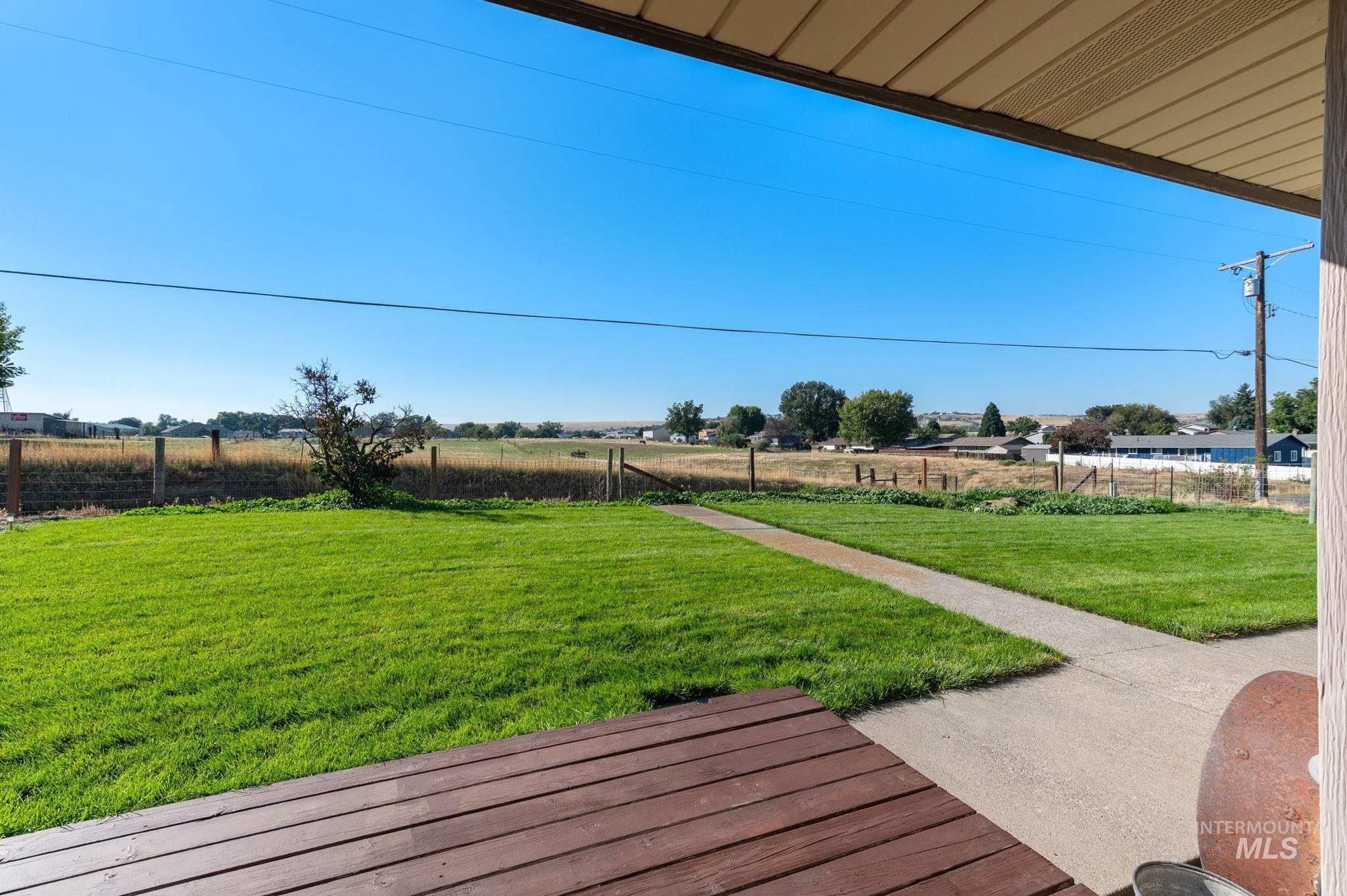 2208 4th Avenue Clarkston, WA 99403 - Photo 3 of 27 View of yard with a view of rural / pastoral area and a deck
