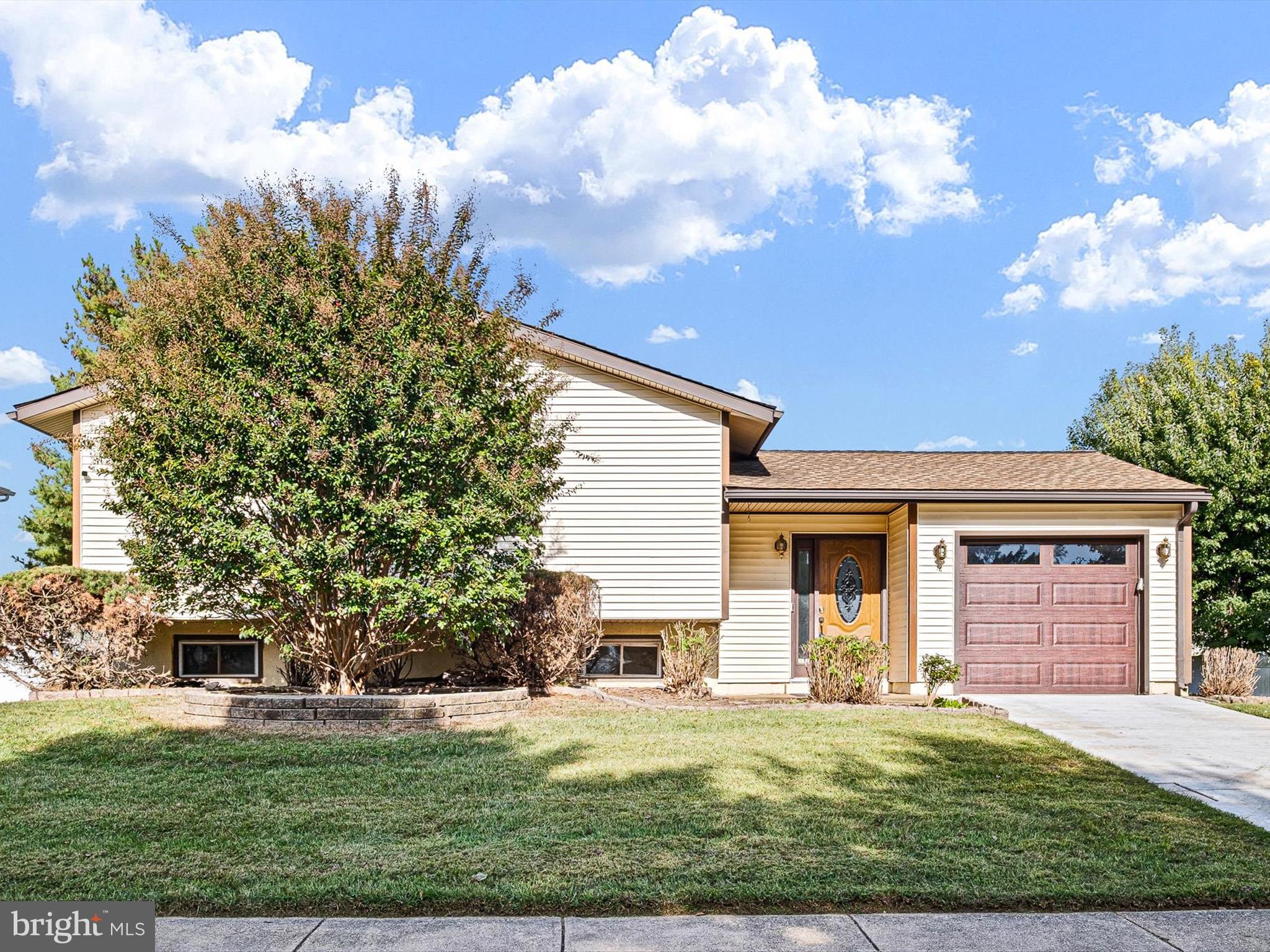 74 Valley Forge Road New Castle, DE 19720 - Photo 1 of 30 front view of a house with yard