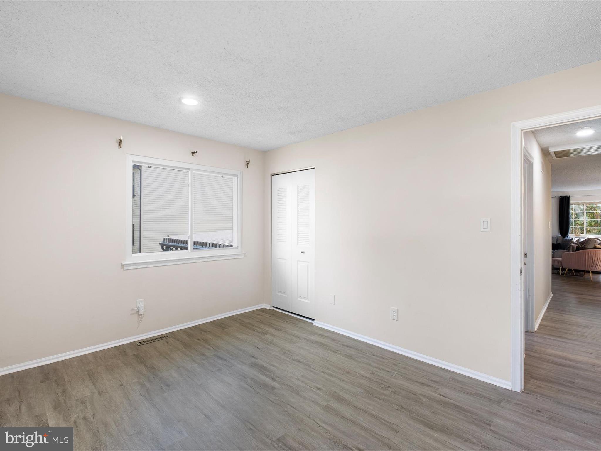 74 Valley Forge Road New Castle, DE 19720 - Photo 23 of 30 a view of a room with wooden floor and a window