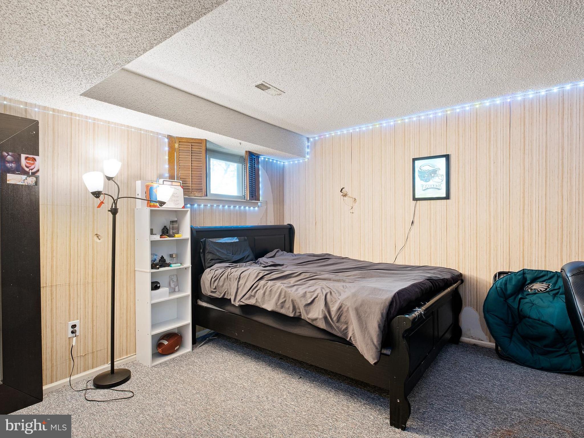 74 Valley Forge Road New Castle, DE 19720 - Photo 29 of 30 a bedroom with a bed and a night stand