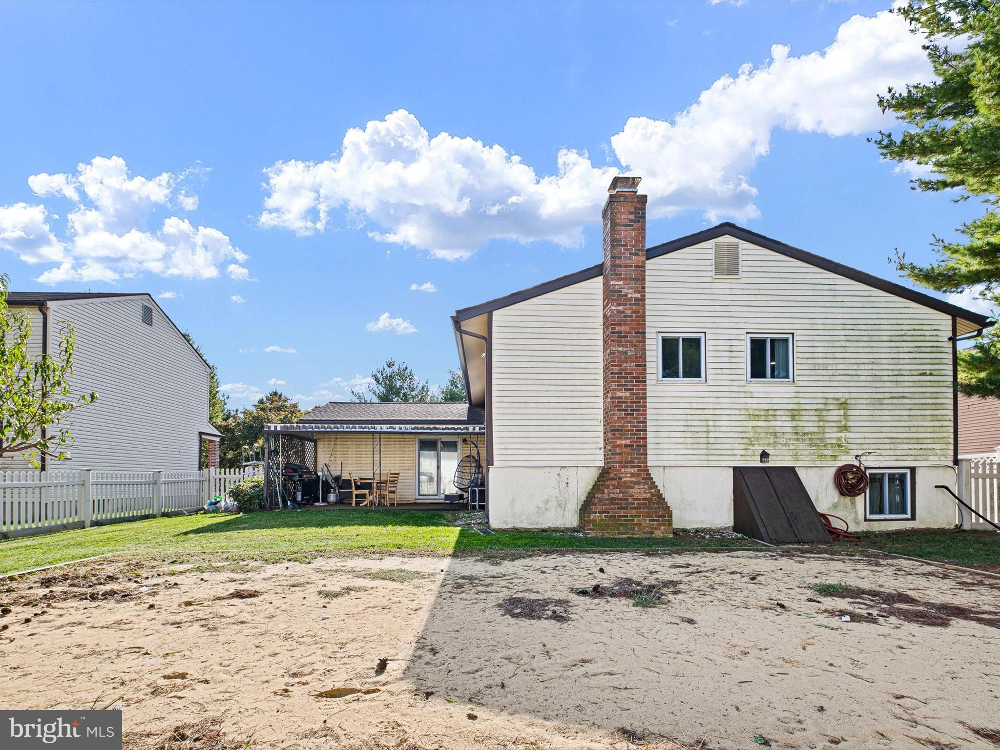 74 Valley Forge Road New Castle, DE 19720 - Photo 4 of 30 a front view of a house with a yard and garage