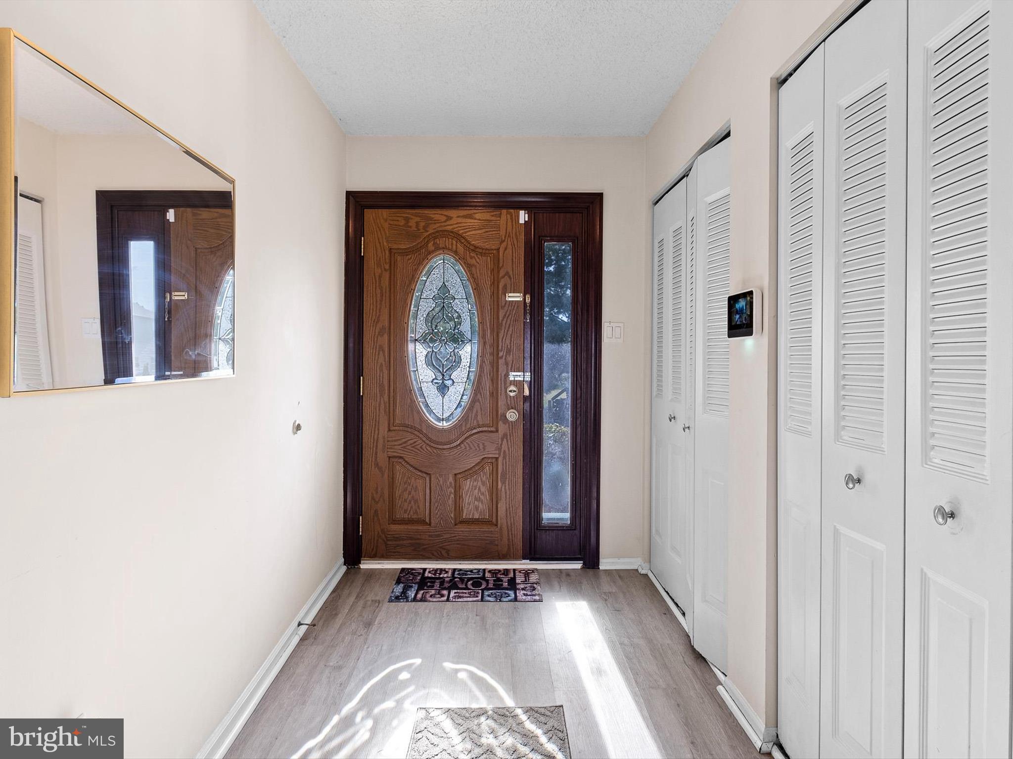 74 Valley Forge Road New Castle, DE 19720 - Photo 6 of 30 a view of a hallway with wooden floor