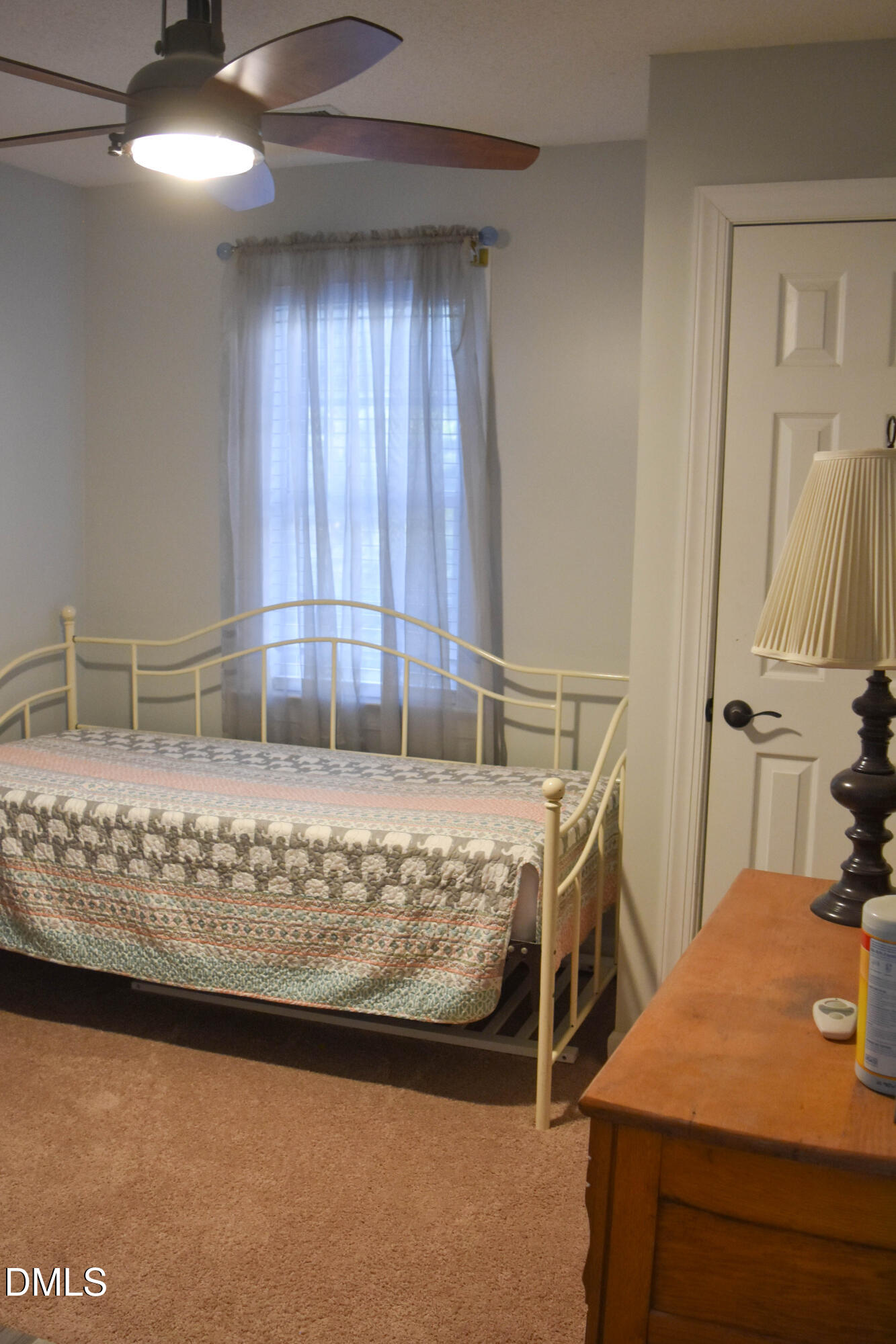 5908 Deep Spring Circle Wake Forest, NC 27587 - Photo 37 of 51 a bed sitting in a room next to a window