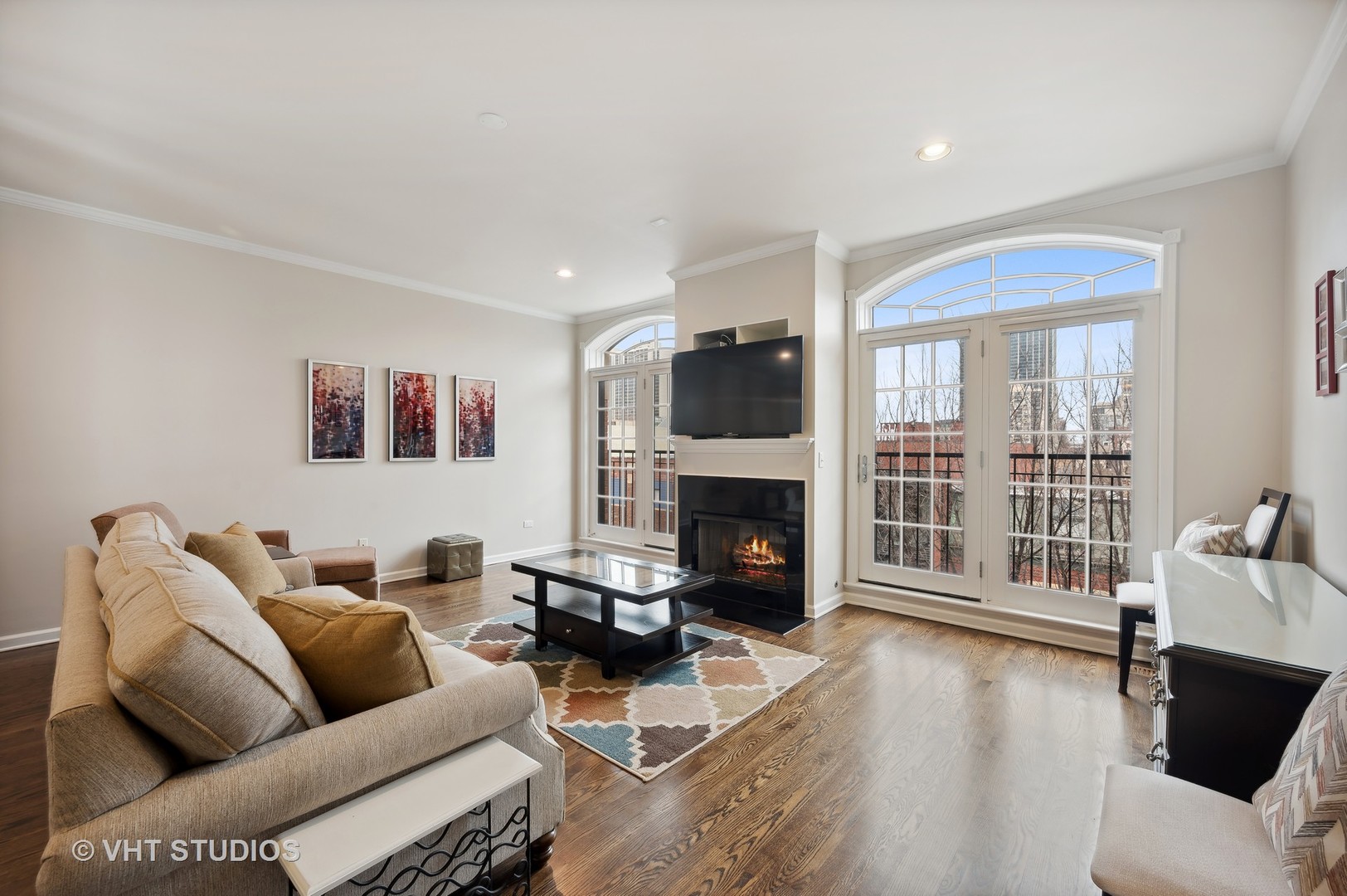 1508 North Sedgwick Street, Unit 5N Chicago, IL 60610 - Photo 2 of 20 a living room with furniture and a fireplace