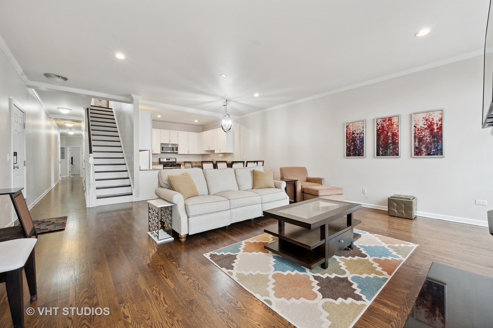 1508 North Sedgwick Street, Unit 5N Chicago, IL 60610 - Photo 8 of 20 a living room with furniture and wooden floor