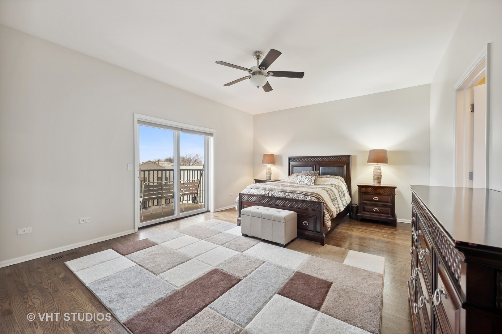 1508 North Sedgwick Street, Unit 5N Chicago, IL 60610 - Photo 9 of 20 a bedroom with a large bed and a chandelier