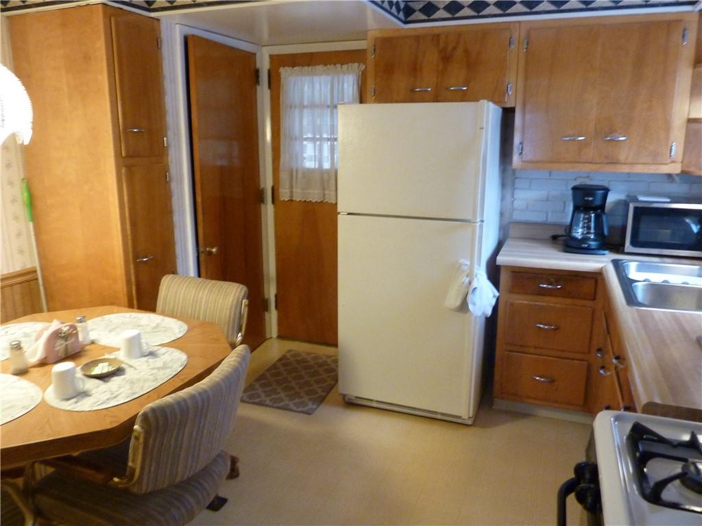 2 Fenway Road Pittsburgh, PA 15209 - Photo 6 of 15 a kitchen with a refrigerator and a stove