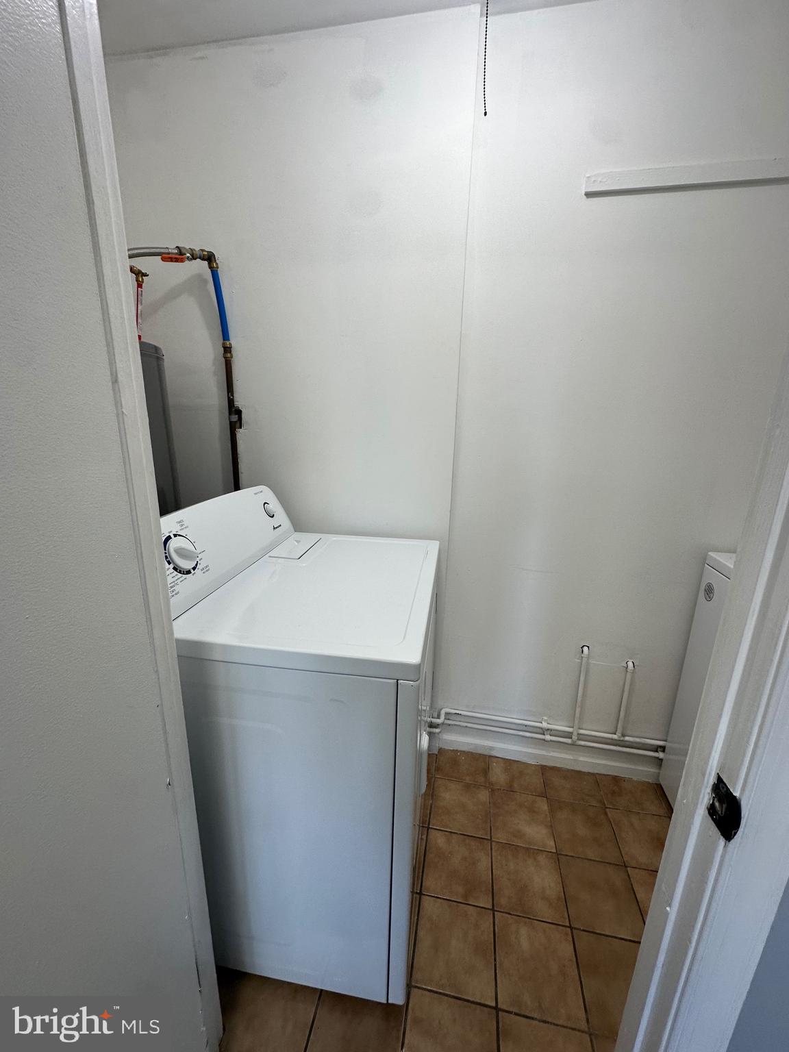 612 North Shady Retreat Road, Unit 14 Doylestown, PA 18901 - Photo 14 of 17 a utility room with dryer and washer