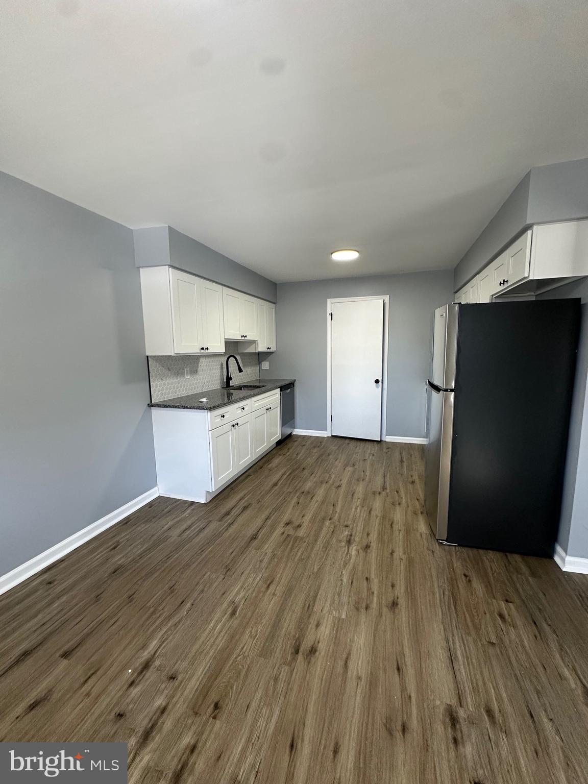 612 North Shady Retreat Road, Unit 14 Doylestown, PA 18901 - Photo 17 of 17 a view of kitchen with wooden floor and electronic appliances