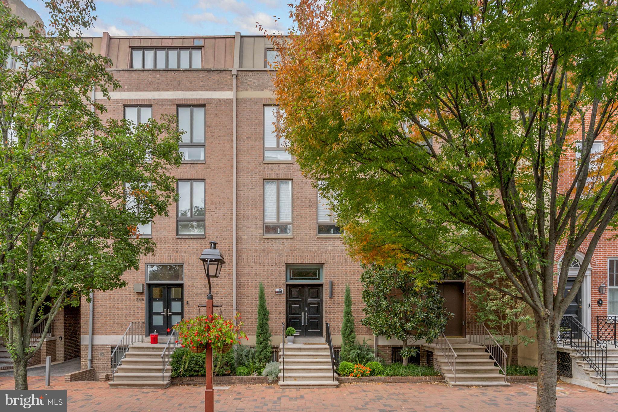 254 South 3rd Street Philadelphia, PA 19106 - Photo 1 of 73 a front view of a house with a tree