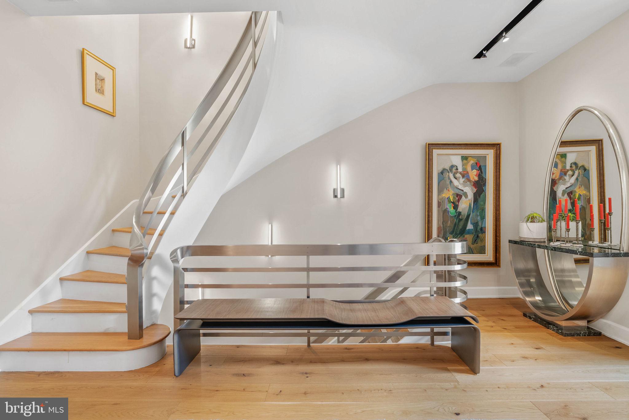 254 South 3rd Street Philadelphia, PA 19106 - Photo 11 of 73 a living room with wooden floor furniture and a rug