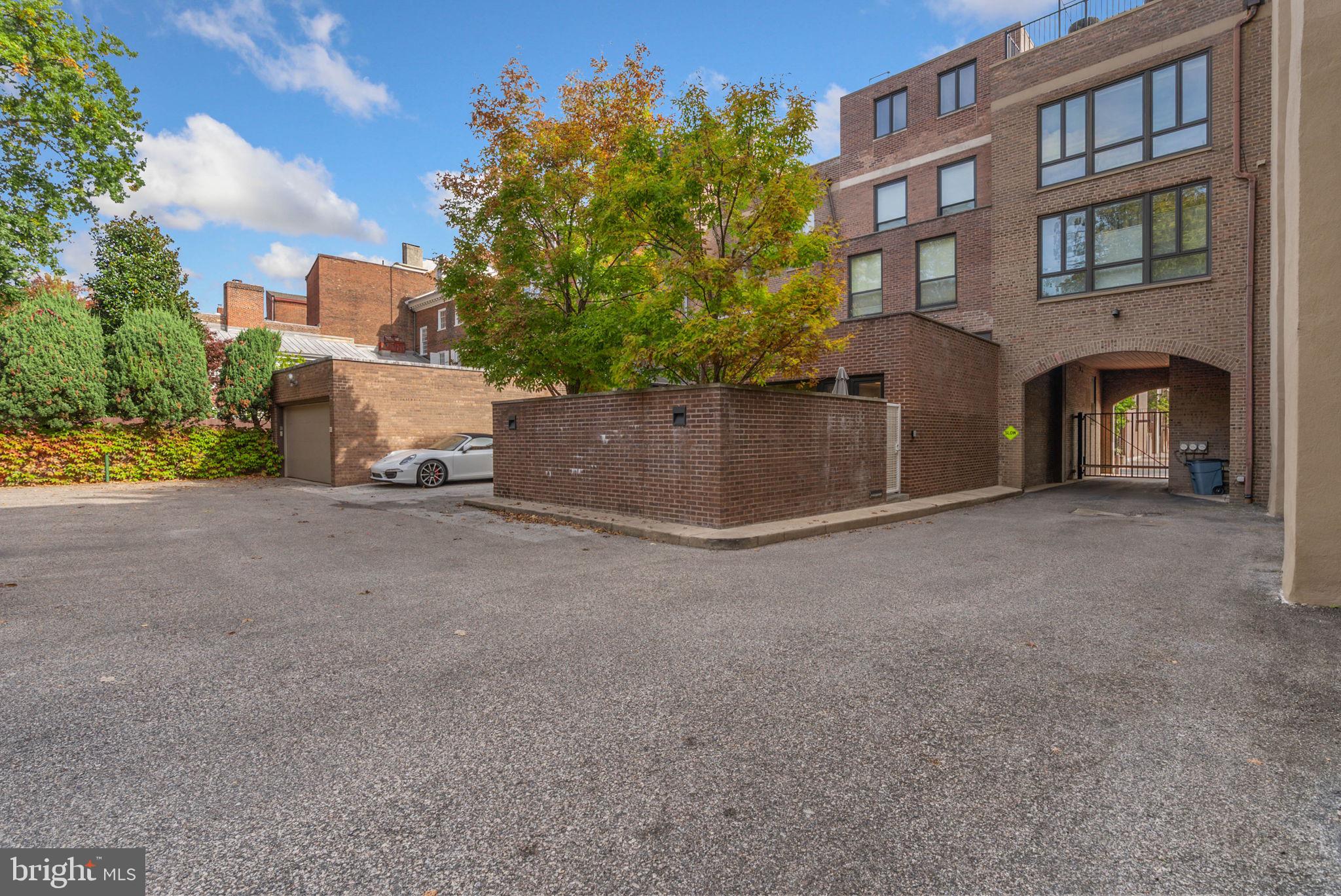 254 South 3rd Street Philadelphia, PA 19106 - Photo 24 of 73 a view of a house with a yard and garage