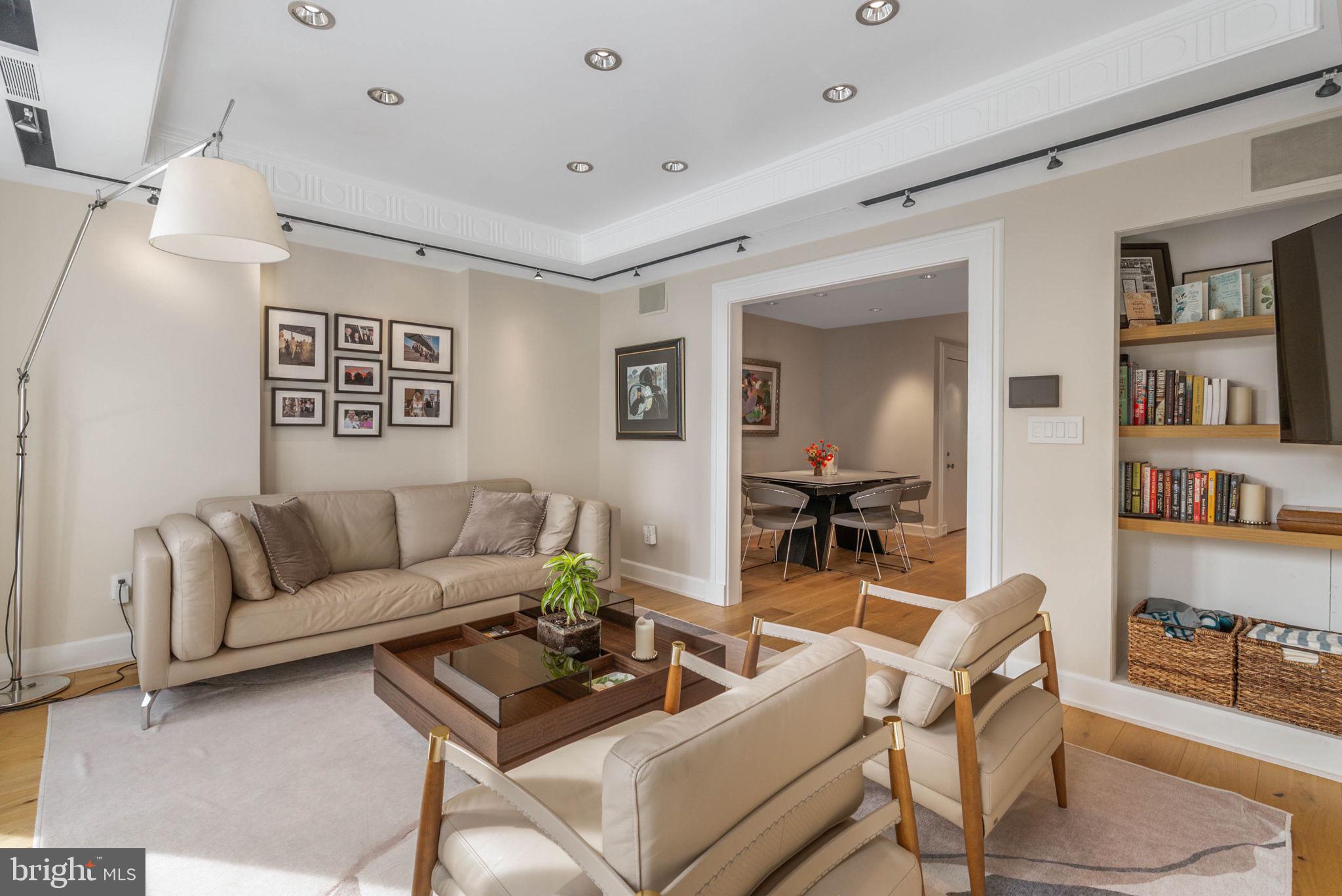 254 South 3rd Street Philadelphia, PA 19106 - Photo 35 of 73 a living room with furniture and a wooden floor