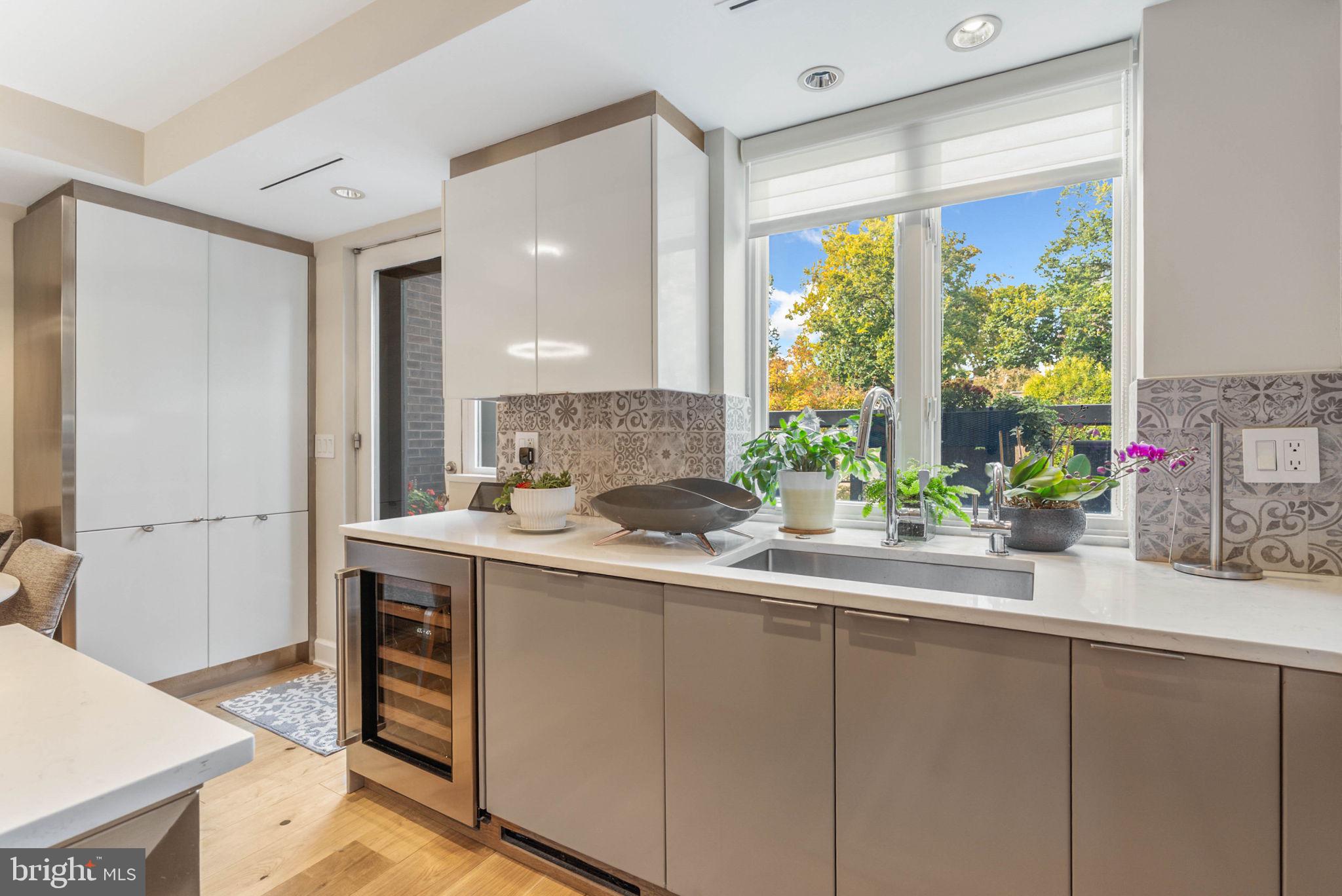254 South 3rd Street Philadelphia, PA 19106 - Photo 39 of 73 a kitchen with a sink and large window