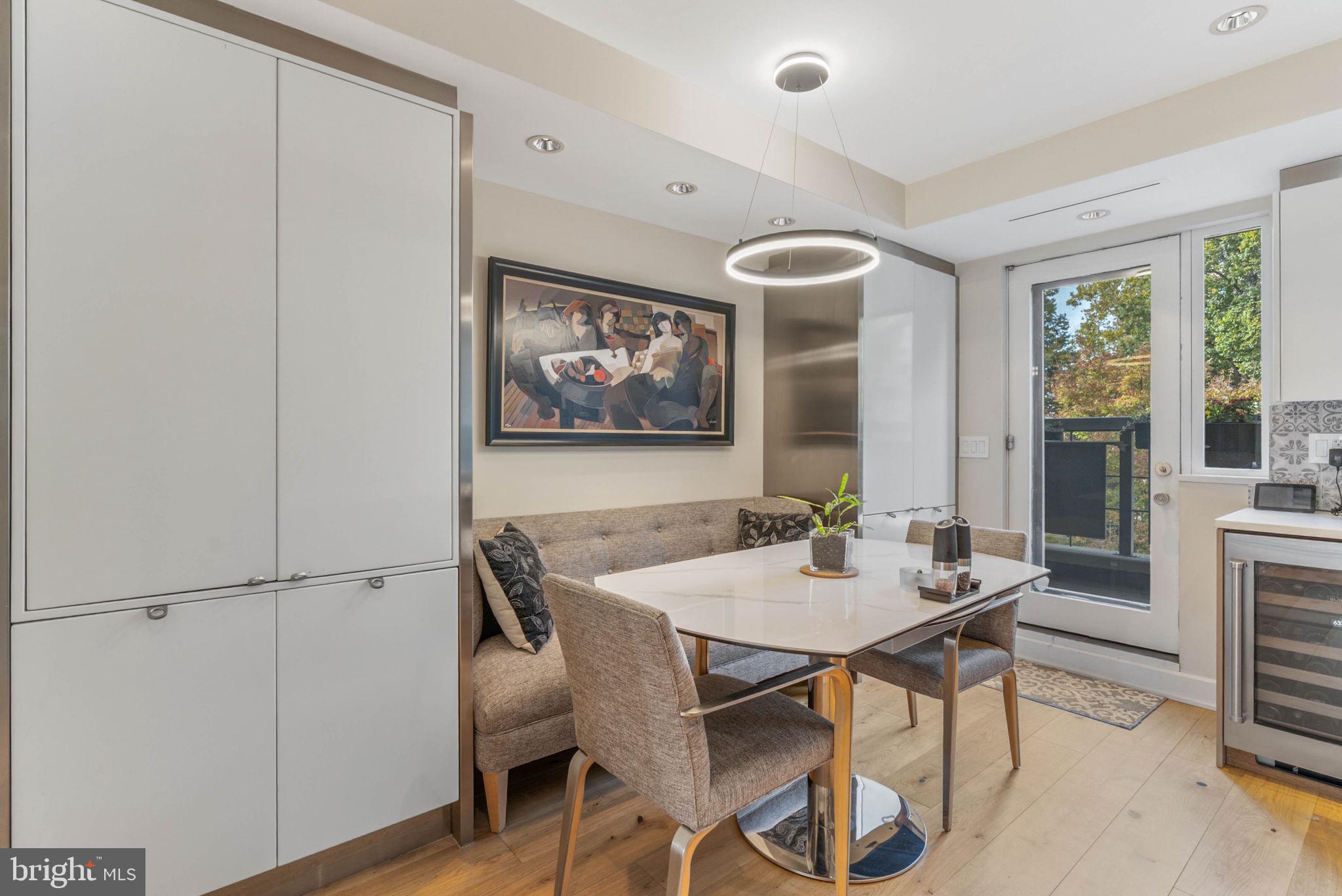 254 South 3rd Street Philadelphia, PA 19106 - Photo 41 of 73 a view of a dining room with furniture window and wooden floor