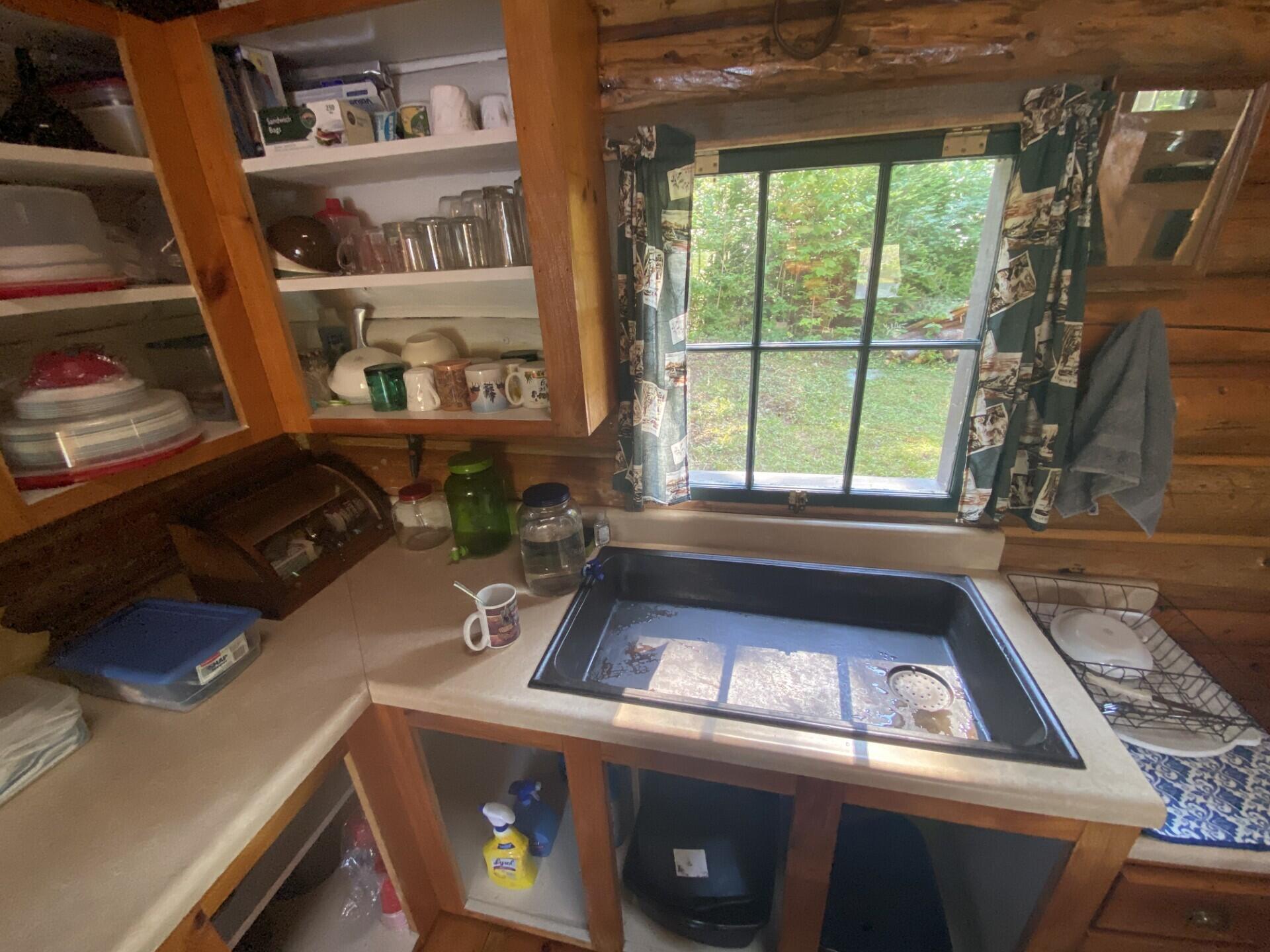 Lot 14 Rowe Pond Road Bingham, ME 04920 - Photo 11 of 49 Sink at the main cabin
