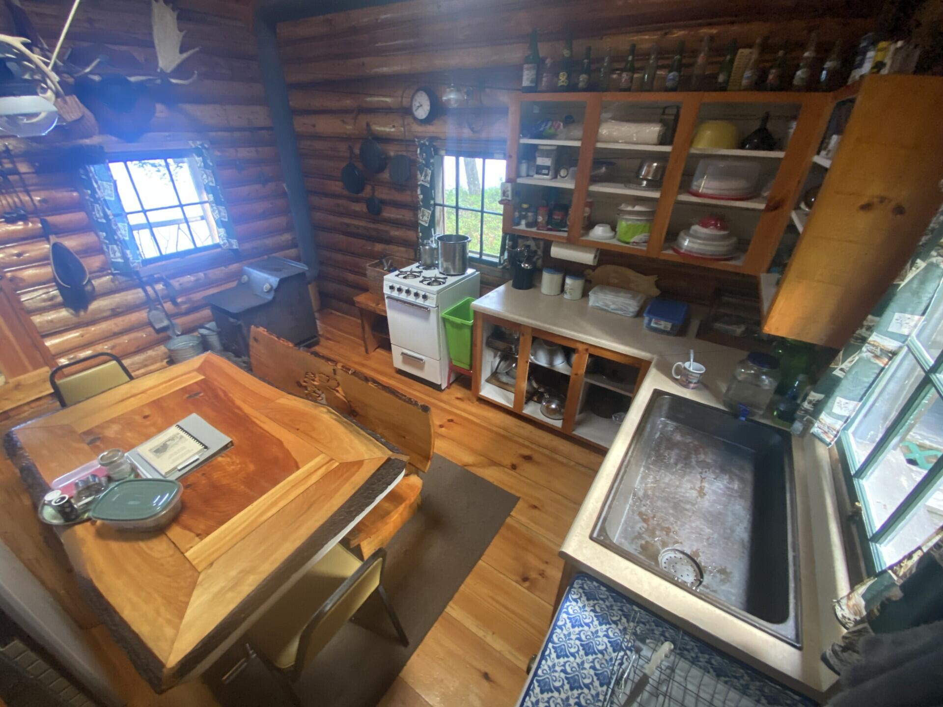 Lot 14 Rowe Pond Road Bingham, ME 04920 - Photo 15 of 49 Kitchen table and sink