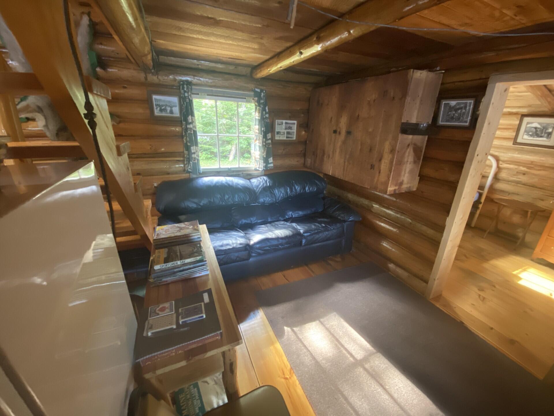 Lot 14 Rowe Pond Road Bingham, ME 04920 - Photo 16 of 49 Main camp living area to bedroom