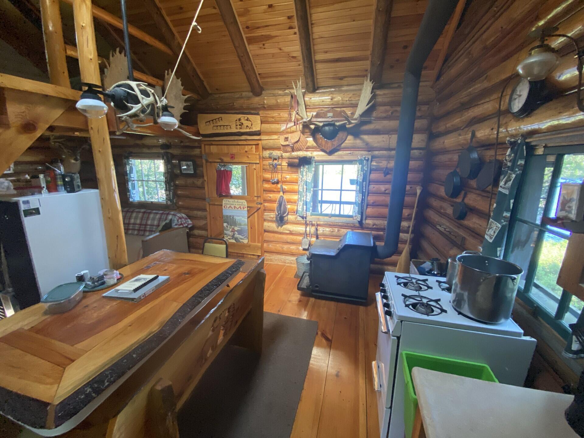 Lot 14 Rowe Pond Road Bingham, ME 04920 - Photo 9 of 49 Toward the main cabin porch