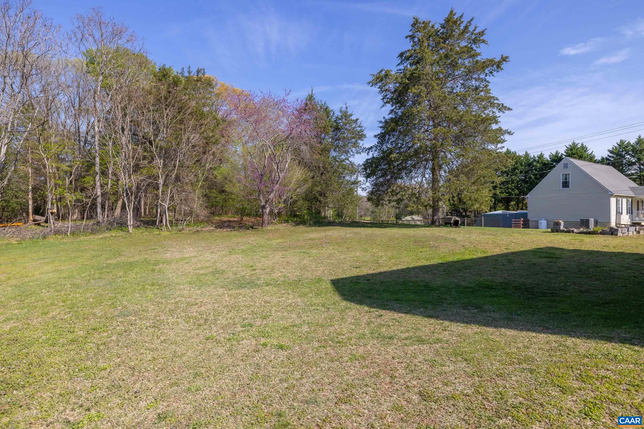 6183 Spring Hill Road Ruckersville, VA 22968 - Photo 12 of 31 a view of a house with a yard