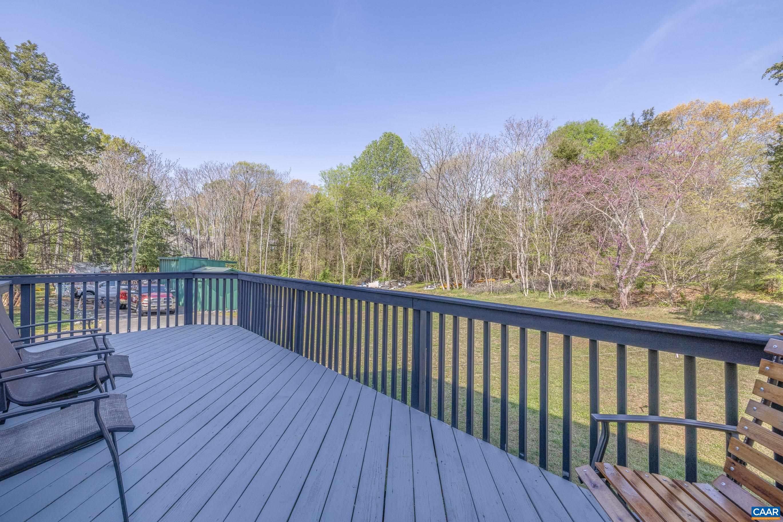 6183 Spring Hill Road Ruckersville, VA 22968 - Photo 13 of 31 a balcony with wooden floor and fence